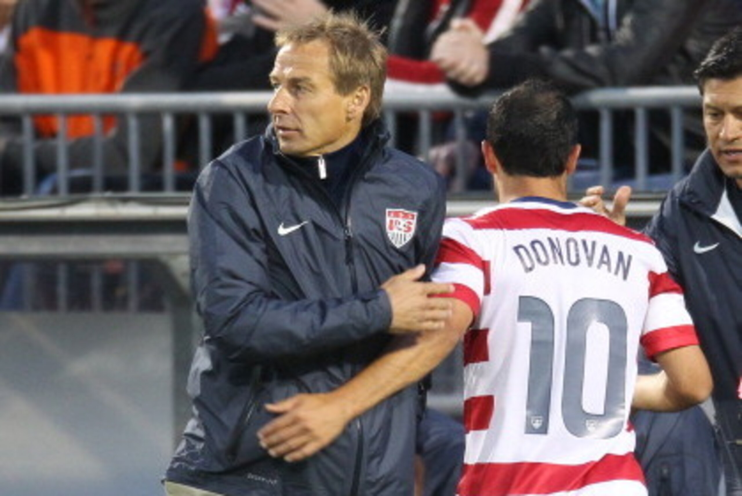 TORONTO, CANADA - JUNE 3: Head coach Jurgen Klinsmann of USA congratulates Landon Donovan #10 as he walks off the field in the second half after a substitution against Canada during their international friendly match on June 3, 2012 at BMO Field in Toront