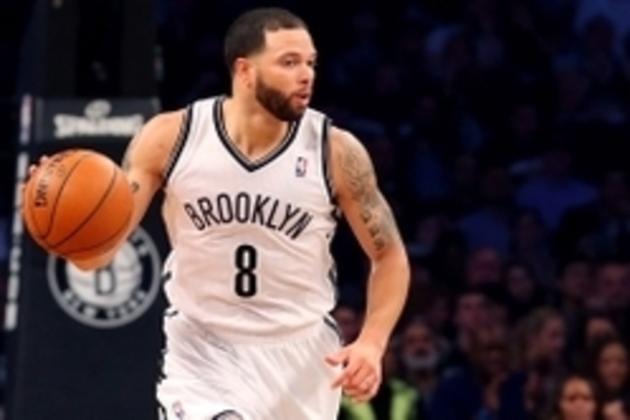 May 10, 2014; Brooklyn, NY, USA; Brooklyn Nets guard Deron Williams (8) advances the ball during the fourth quarter against the Miami Heat in game three of the second round of the 2014 NBA Playoffs at Barclays Center. Brooklyn Nets won 104-90.  Mandatory 