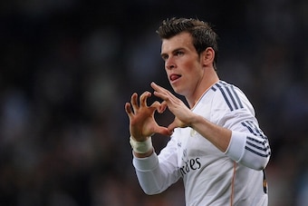 MADRID, SPAIN - APRIL 12:  Gareth Bale of Real Madrid celebrates after scoring Real's 2nd goal during the La Liga match between Real Madrid and Almeria at Santiago Bernabeu stadium on April 12, 2014 in Madrid, Spain.  (Photo by Denis Doyle/Getty Images)