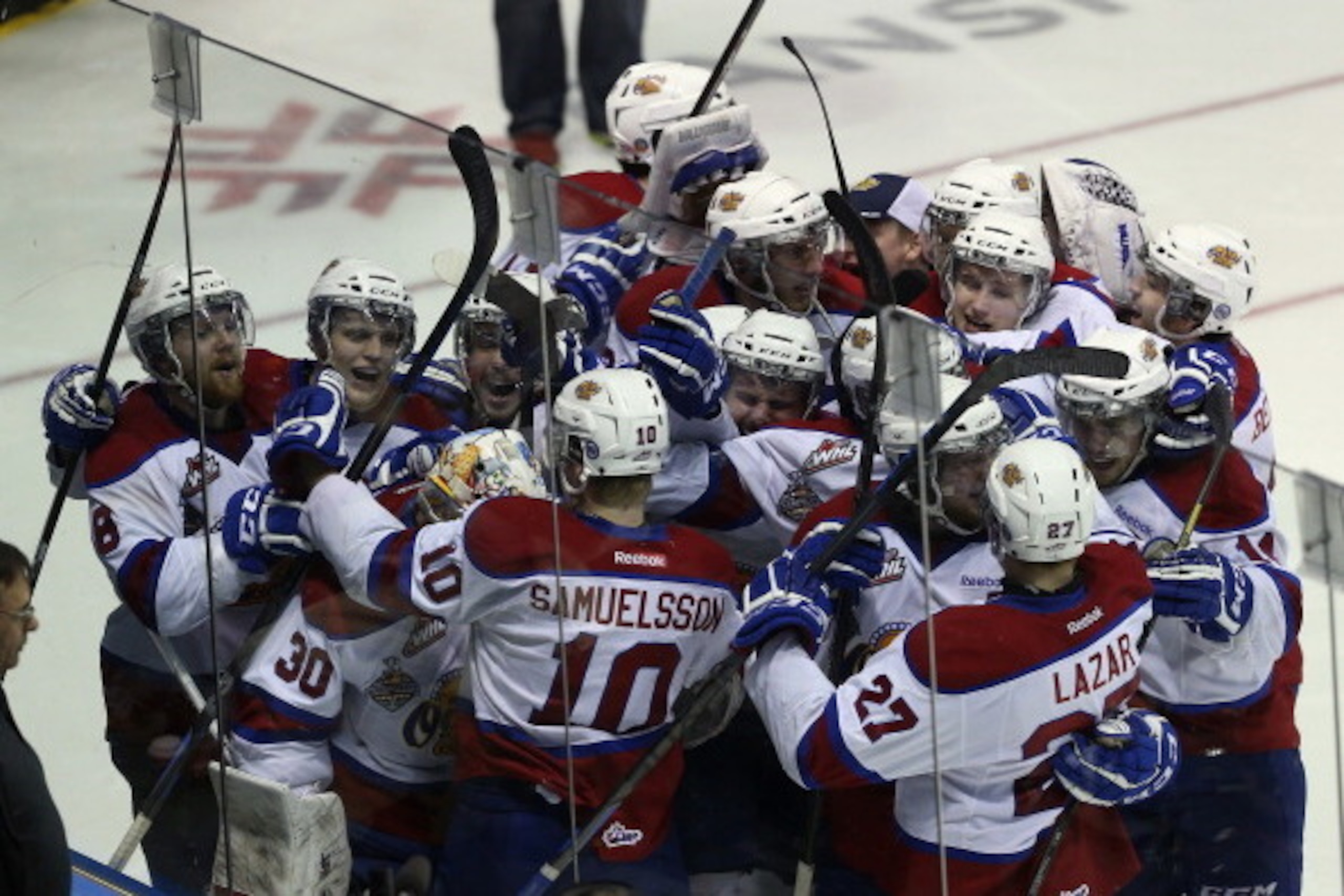 LONDON, ON - MAY 23: The Edmonton Oil Kings celebrate their victory over the Val-d'Or Foreurs  during the 2014 Memorial Cup tournament at Budweiser Gardens on May 23, 2014 in London, Ontario, Canada. The Oil Kings defeated the Foreurs 4-3 in triple overti