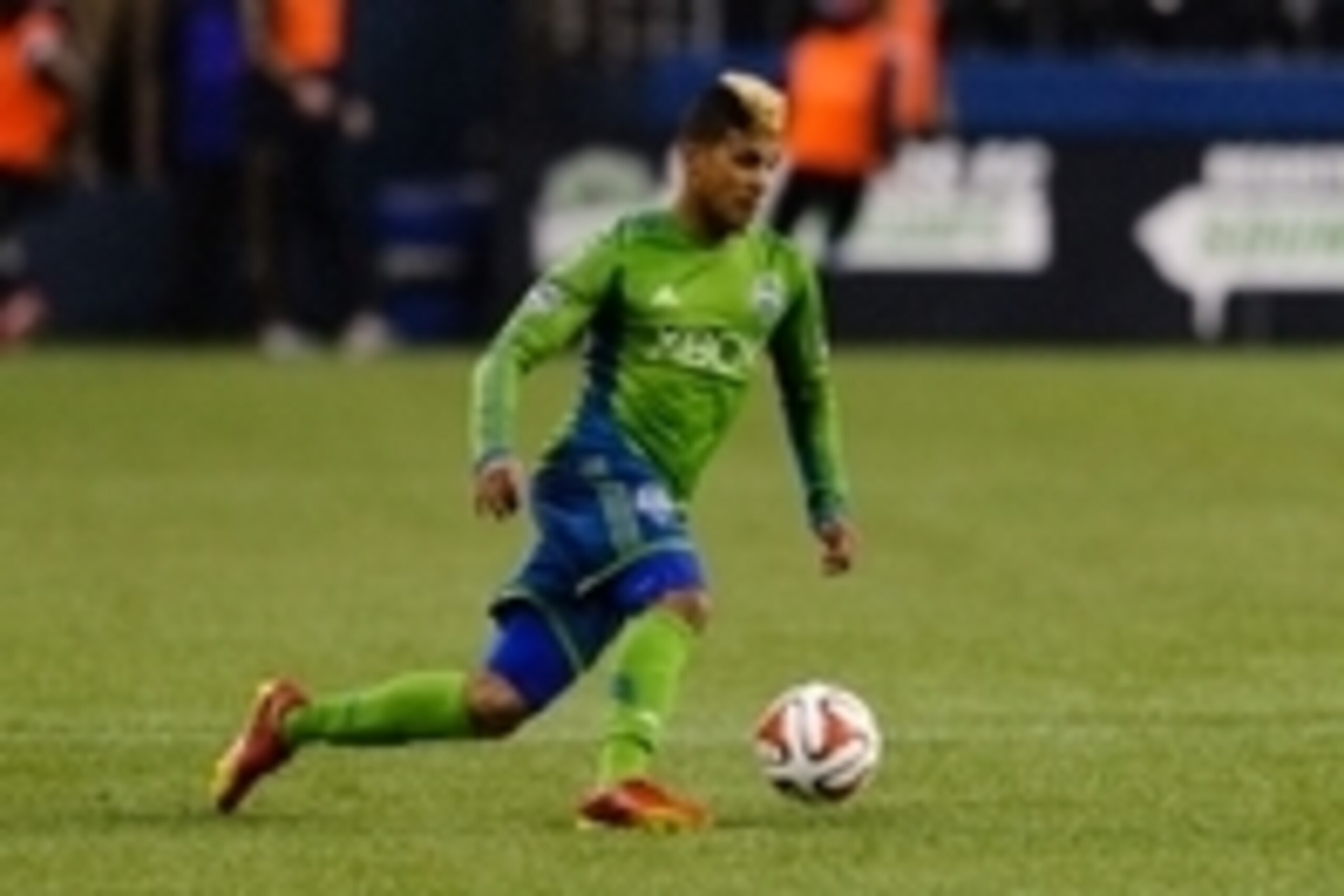 May 3, 2014; Seattle, WA, USA; Seattle Sounders FC defender DeAndre Yedlin (17) dribbles the ball during the game against the Philadelphia Union at CenturyLink Field. Seattle defeated Philadelphia 2-1. Mandatory Credit: Steven Bisig-USA TODAY Sports