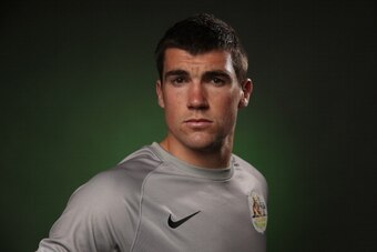 SYDNEY, AUSTRALIA - MAY 23:  Mat Ryan of the Socceroos poses during an Australian Socceroos portrait session at the Intercontinental on May 23, 2014 in Sydney, Australia.  (Photo by Cameron Spencer/Getty Images)