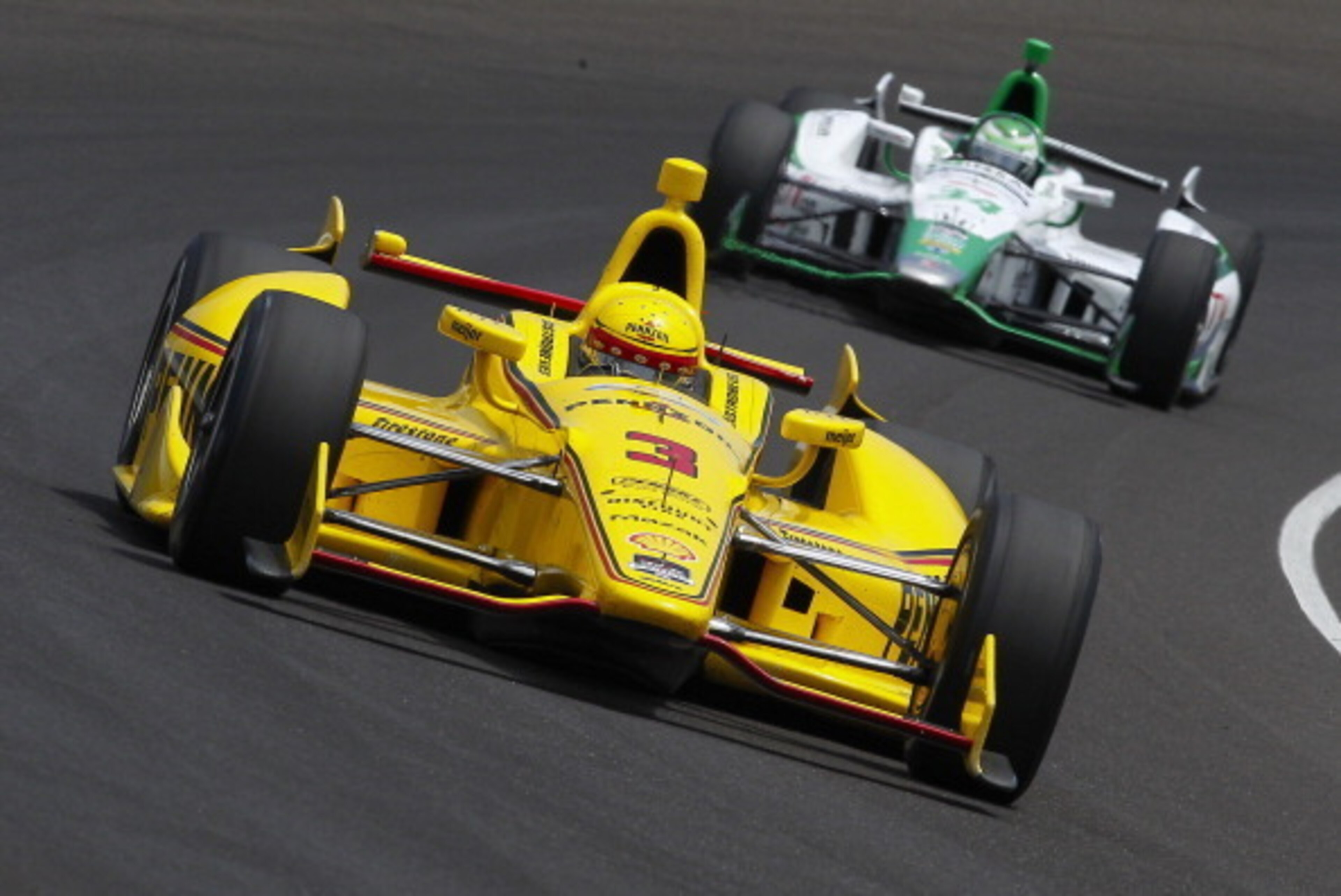 INDIANAPOLIS, IN - MAY 19: Helio Castroneves of Brazil, driver of the #3 Pennzoil Team Penske Chevrolet Dallara is seen on the track during practice for the Indy 500 at the Indianapolis Motor Speedway on May 19, 2014 in Indianapolis, Indiana. (Photo by Mi INDIANAPOLIS, IN - MAY 19: Helio Castroneves of Brazil, driver of the #3 Pennzoil Team Penske Chevrolet Dallara is seen on the track during practice for the Indy 500 at the Indianapolis Motor Speedway on May 19, 2014 in Indianapolis, Indiana. (Photo by Mi