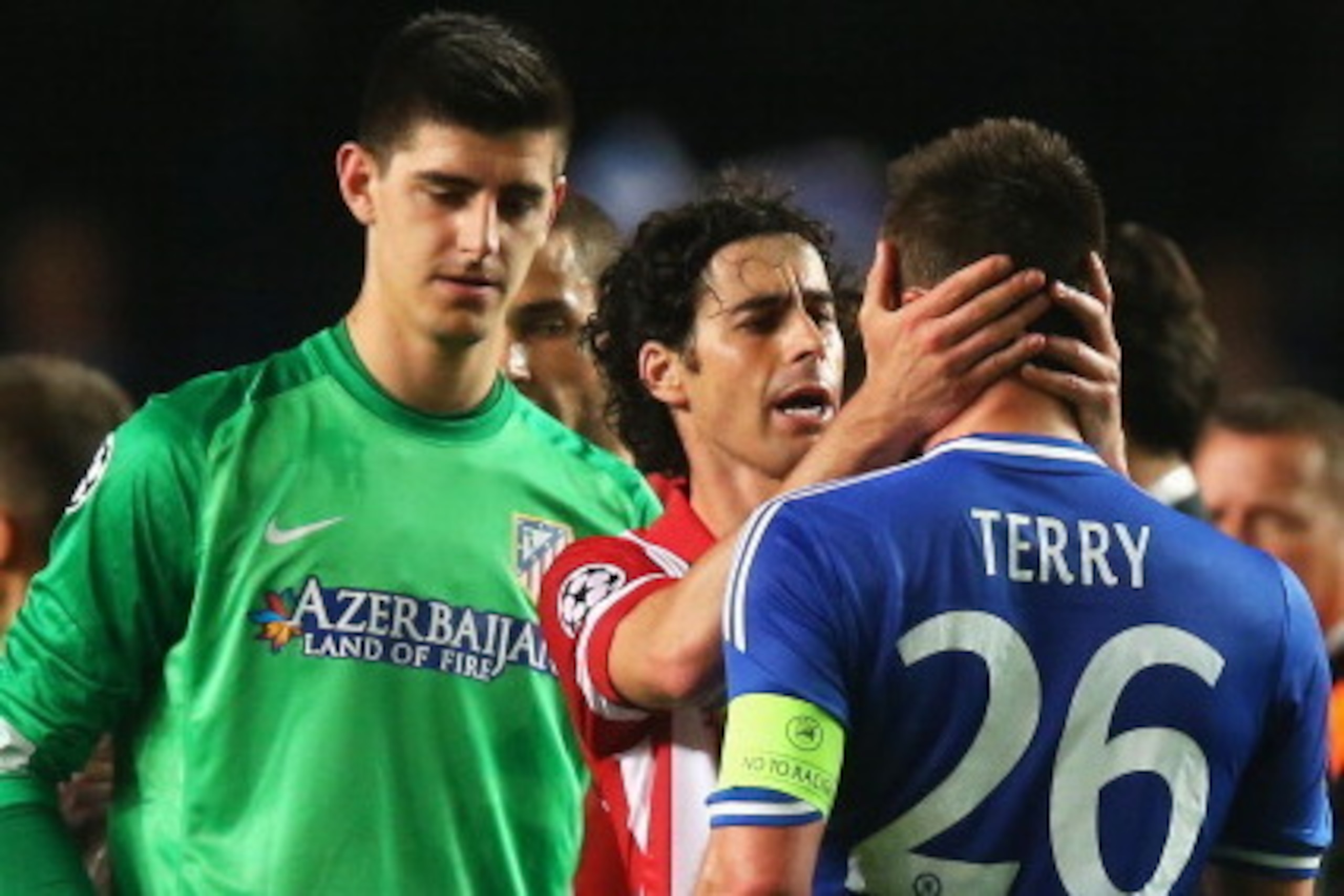 LONDON, ENGLAND - APRIL 30: Tiago of Club Atletico de Madrid consoles John Terry of Chelsea as Thibaut Courtois (L) looks on after the UEFA Champions League semi-final second leg match between Chelsea and Club Atletico de Madrid at Stamford Bridge on Apri