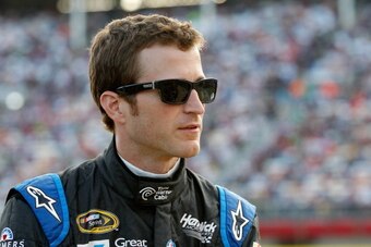 CHARLOTTE, NC - MAY 17:  Kasey Kahne, driver of the #5 Time Warner Cable Chevrolet, stands on the grid during qualifying for the NASCAR Sprint Cup Series Sprint All-Star Race at Charlotte Motor Speedway on May 17, 2014 in Charlotte, North Carolina.  (Phot
