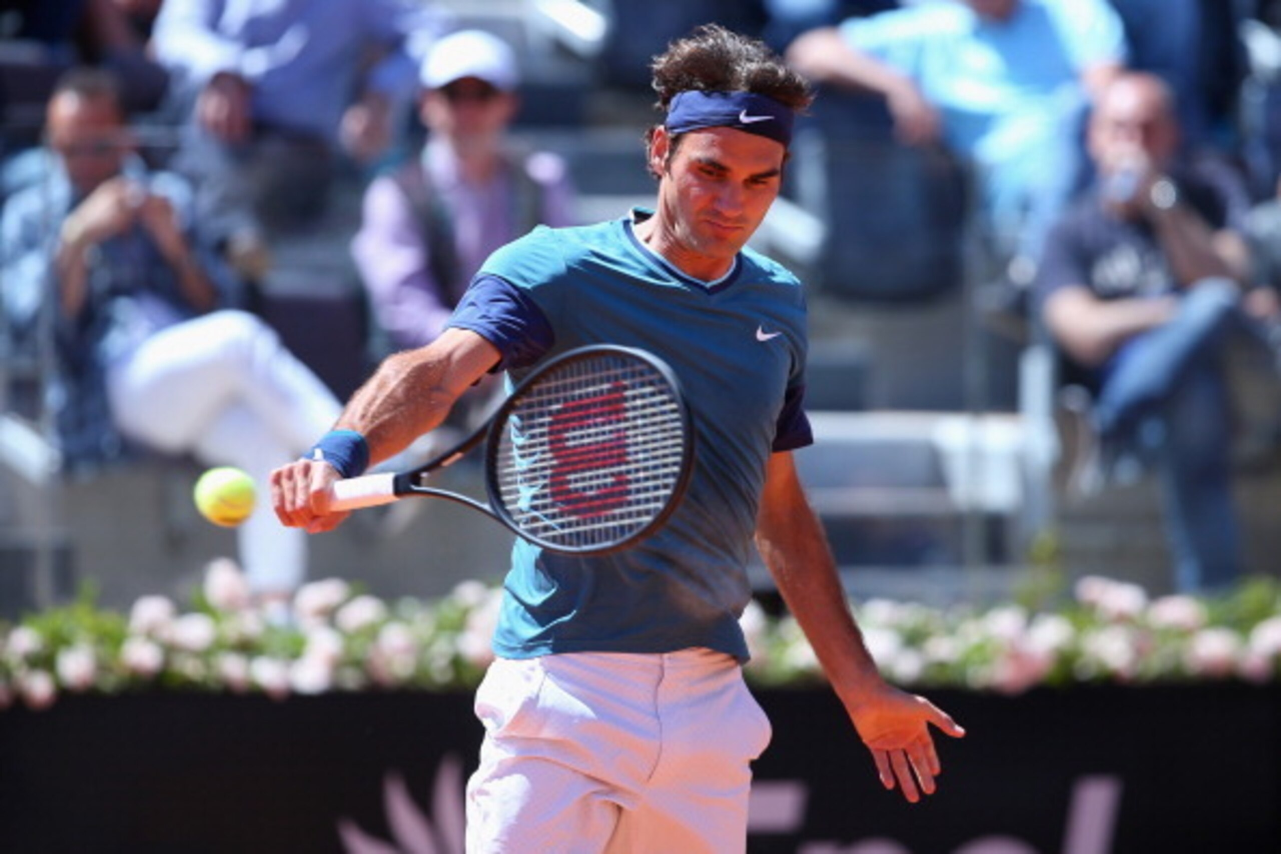 ROME, ITALY - MAY 14: Roger Federer of Switzerland in action in his match against Jeremy Chardy of France during day four of the Internazionali BNL d'Italia tennis 2014 on May 14, 2014 in Rome, Italy. (Photo by Julian Finney/Getty Images) ROME, ITALY - MAY 14: Roger Federer of Switzerland in action in his match against Jeremy Chardy of France during day four of the Internazionali BNL d'Italia tennis 2014 on May 14, 2014 in Rome, Italy. (Photo by Julian Finney/Getty Images)