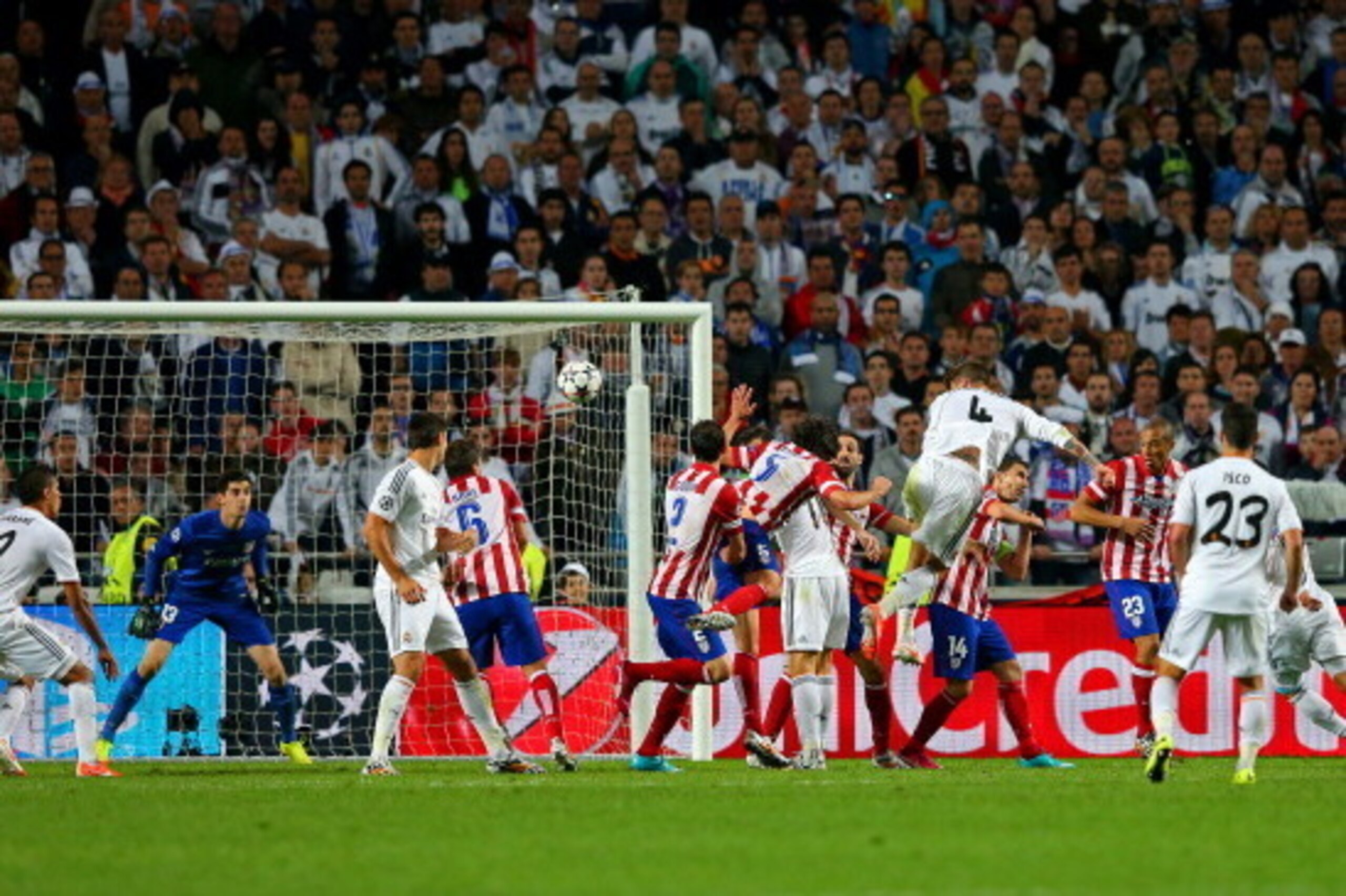 LISBON, PORTUGAL - MAY 24:  Sergio Ramos of Real Madrid heads in their first goal during the UEFA Champions League Final between Real Madrid and Atletico de Madrid at Estadio da Luz on May 24, 2014 in Lisbon, Portugal.  (Photo by Alex Livesey/Getty Images
