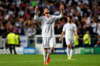 LISBON, PORTUGAL - MAY 24:  Sergio Ramos of Real Madrid celebrates scoring their first goal in stoppage time during the UEFA Champions League Final between Real Madrid and Atletico de Madrid at Estadio da Luz on May 24, 2014 in Lisbon, Portugal.  (Photo b