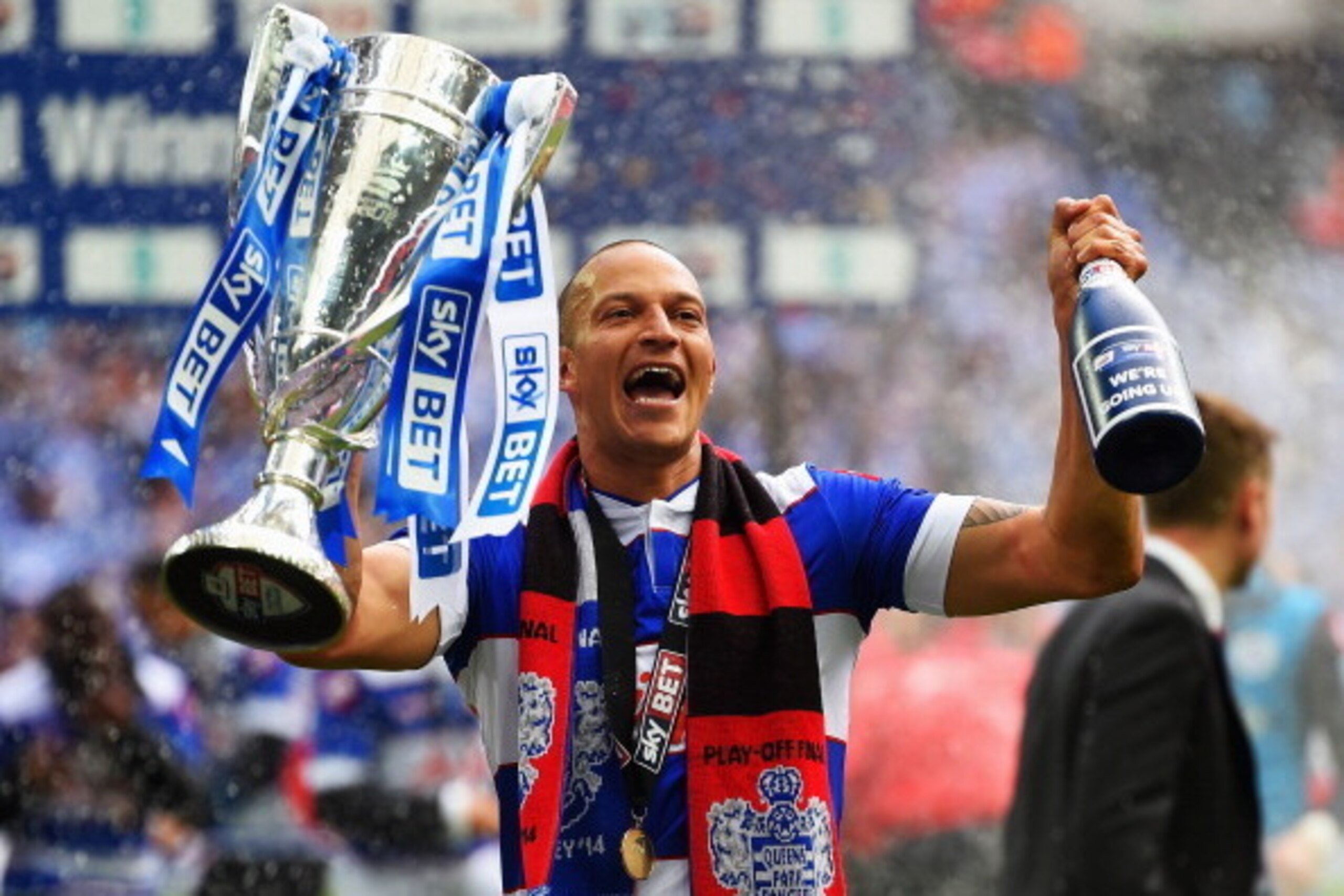 LONDON, ENGLAND - MAY 24:  Match winning goalscorer Bobby Zamora of Queens Park Rangers celebrates with the winners trophy following his sides victory during the Sky Bet Championship Playoff Final between Derby County and Queens Park Rangers at Wembley St