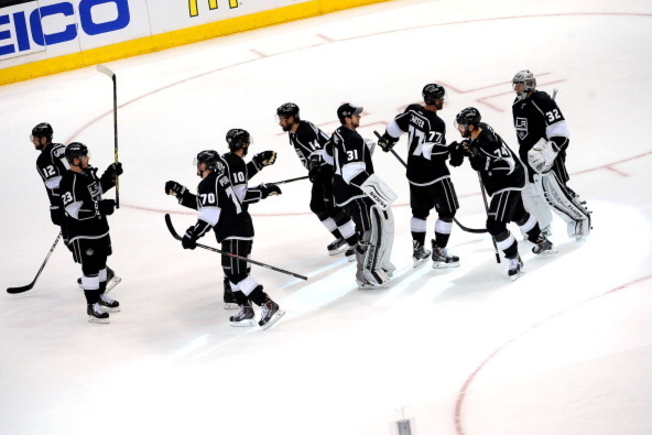 LOS ANGELES, CA - MAY 24:  The Los Angeles Kings celebrate their team's victory over the Chicago Blackhawks in Game Three of the Third Round of the 2014 Stanley Cup Playoffs at Staples Center on May 24, 2014 in Los Angeles, California. (Photo by Noah Grah