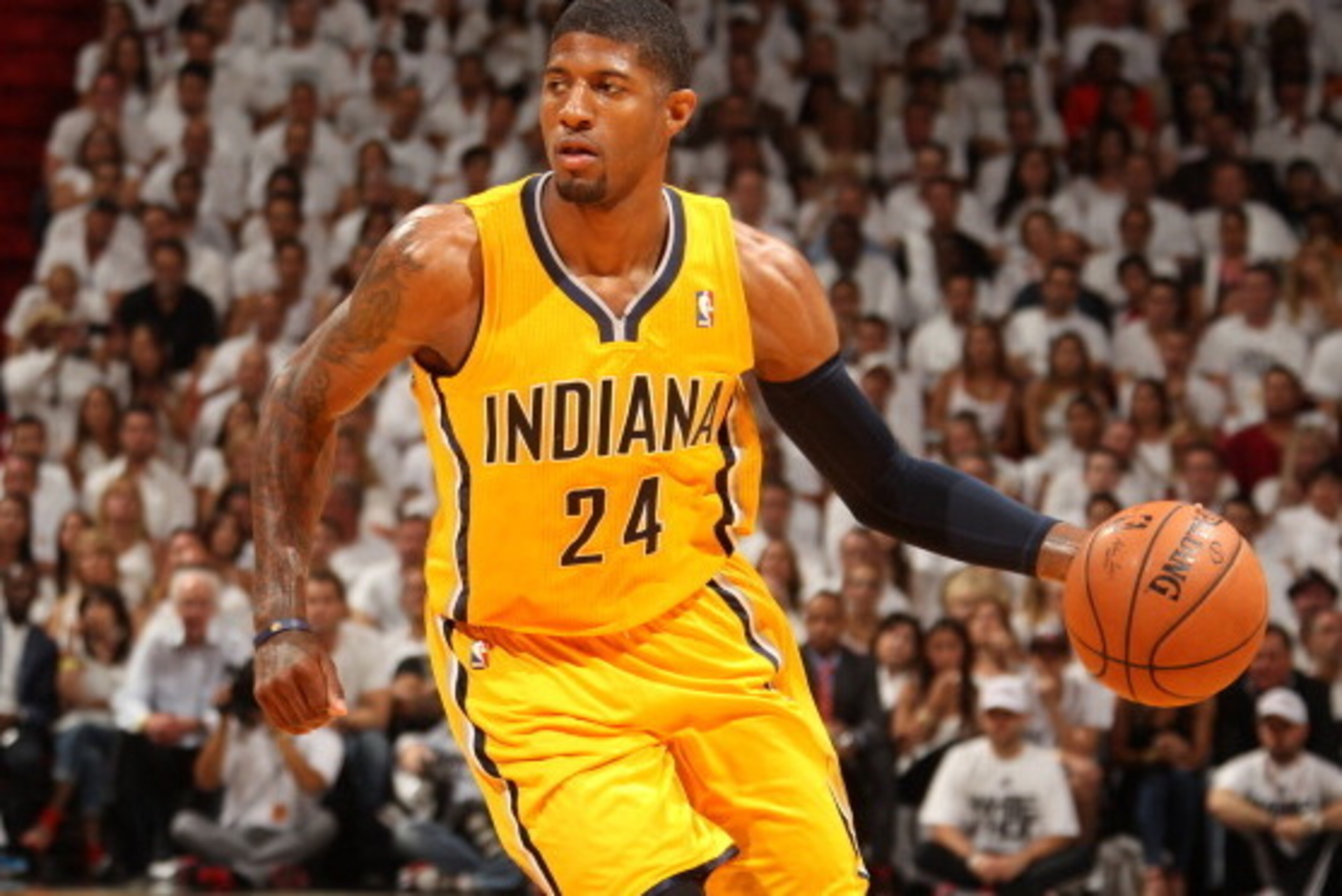 MIAMI, FL - May 24: Paul George #24 of the Indiana Pacers handles the ball against the Miami Heat in Game Three of the Eastern Conference Finals during the 2014 NBA playoffs at the American Airlines Arena in Miami, Florida on May 24, 2014. NOTE TO USER: U