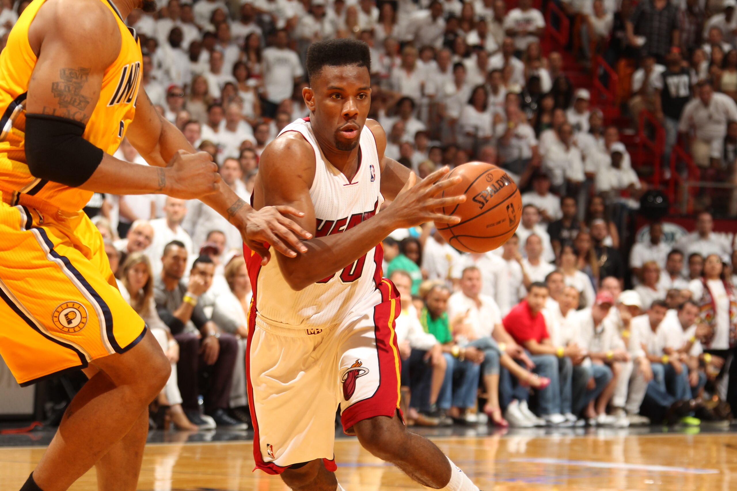 MIAMI, FL - May 24: Norris Cole #30 of the Miami Heat handles the ball against the Indiana Pacers in Game Three of the Eastern Conference Finals during the 2014 NBA playoffs at the American Airlines Arena in Miami, Florida on May 24, 2014. NOTE TO USER: U