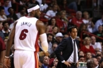 Mar 31, 2014; Miami, FL, USA;  Miami Heat head coach Erik Spoelstra and forward LeBron James (6) in the first half of a game against the Toronto Raptors at American Airlines Arena. Mandatory Credit: Robert Mayer-USA TODAY Sports