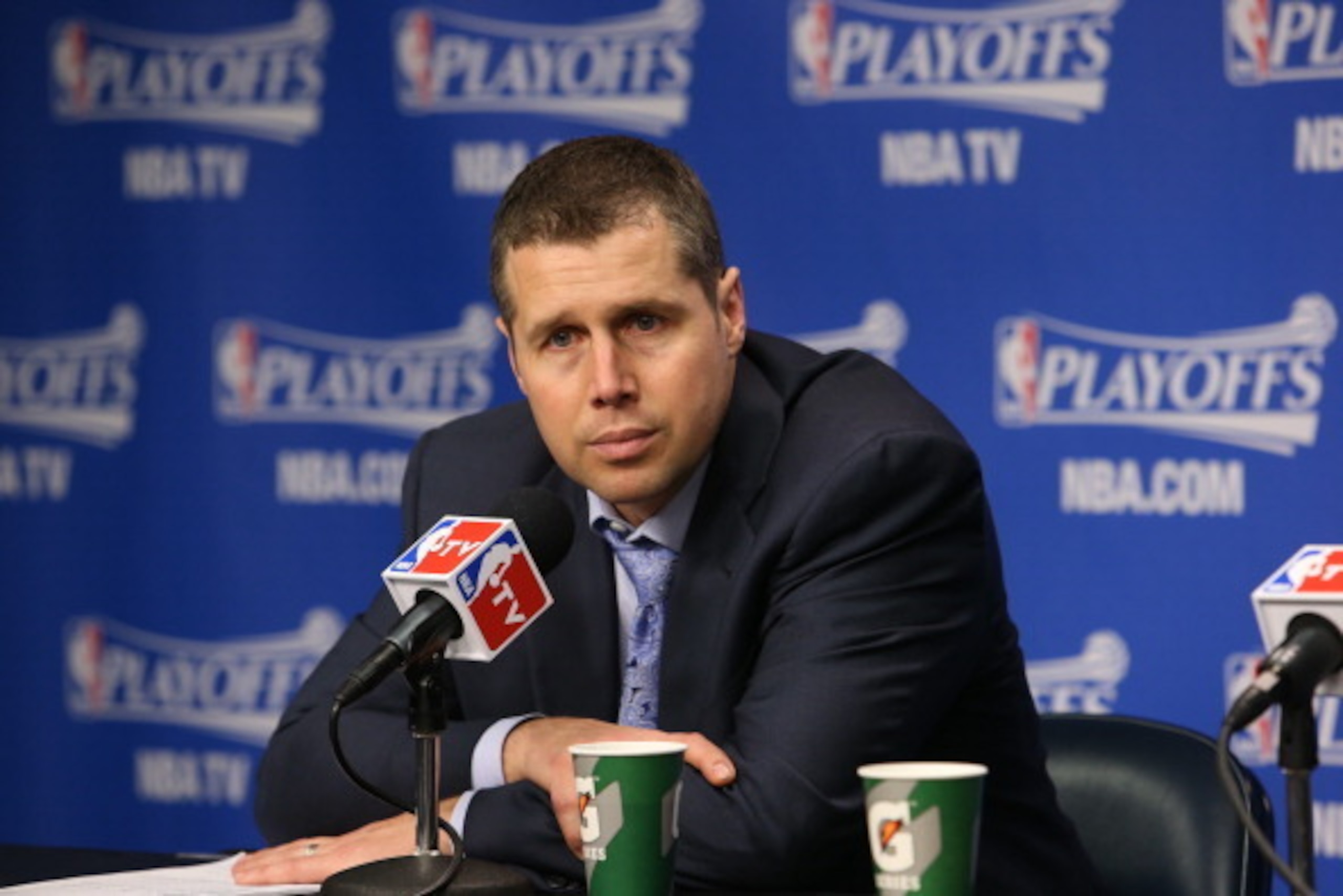 MEMPHIS, TN - MAY 1: Dave Joerger head coach of the Memphis Grizzlies addresses the media after Game Six of the Western Conference Quarterfinals against the Oklahoma City Thunder during the 2014 NBA Playoffs on May 1, 2014 at FedExForum in Memphis, Tennes