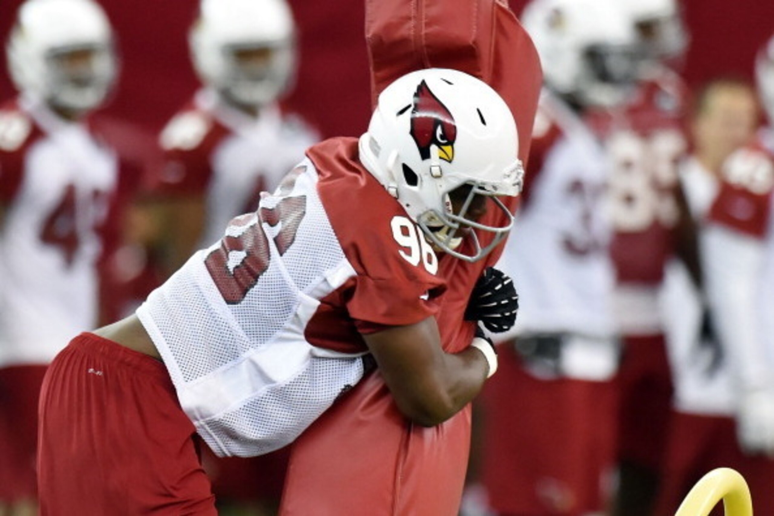 TEMPE, AZ - MAY 23:  Kareem Martin #96 of the Arizona Cardinals pushes a blocking sled during Rookie Minicamp practice on May 23, 2014 in Tempe, Arizona.  (Photo by Norm Hall/Getty Images)