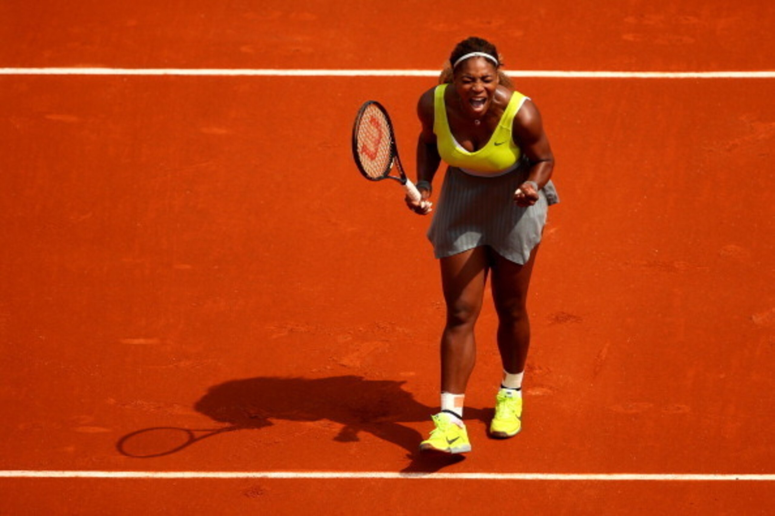 PARIS, FRANCE - MAY 25:  Serena Williams of the United States celebrates a point during her women's singles match against Alize Lim of France on day one of the French Open at Roland Garros on May 25, 2014 in Paris, France.  (Photo by Clive Brunskill/Getty