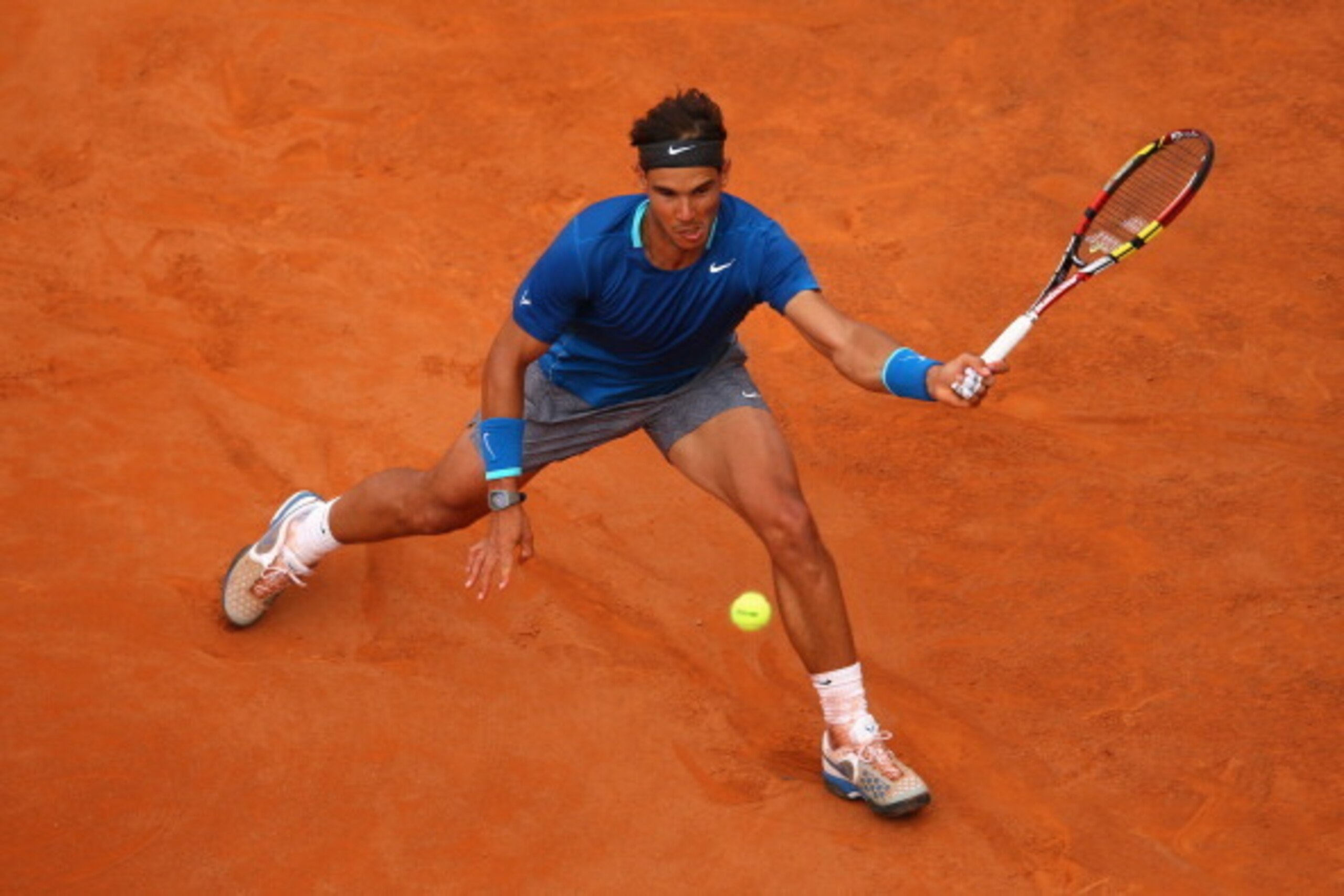 ROME, ITALY - MAY 18:  Rafael Nadal of Spain in action in his match against Novak Djokovic of Serbia in the final during day eight of the Internazionali BNL d'Italia tennis 2014 on May 18, 2014 in Rome, Italy.  (Photo by Julian Finney/Getty Images)