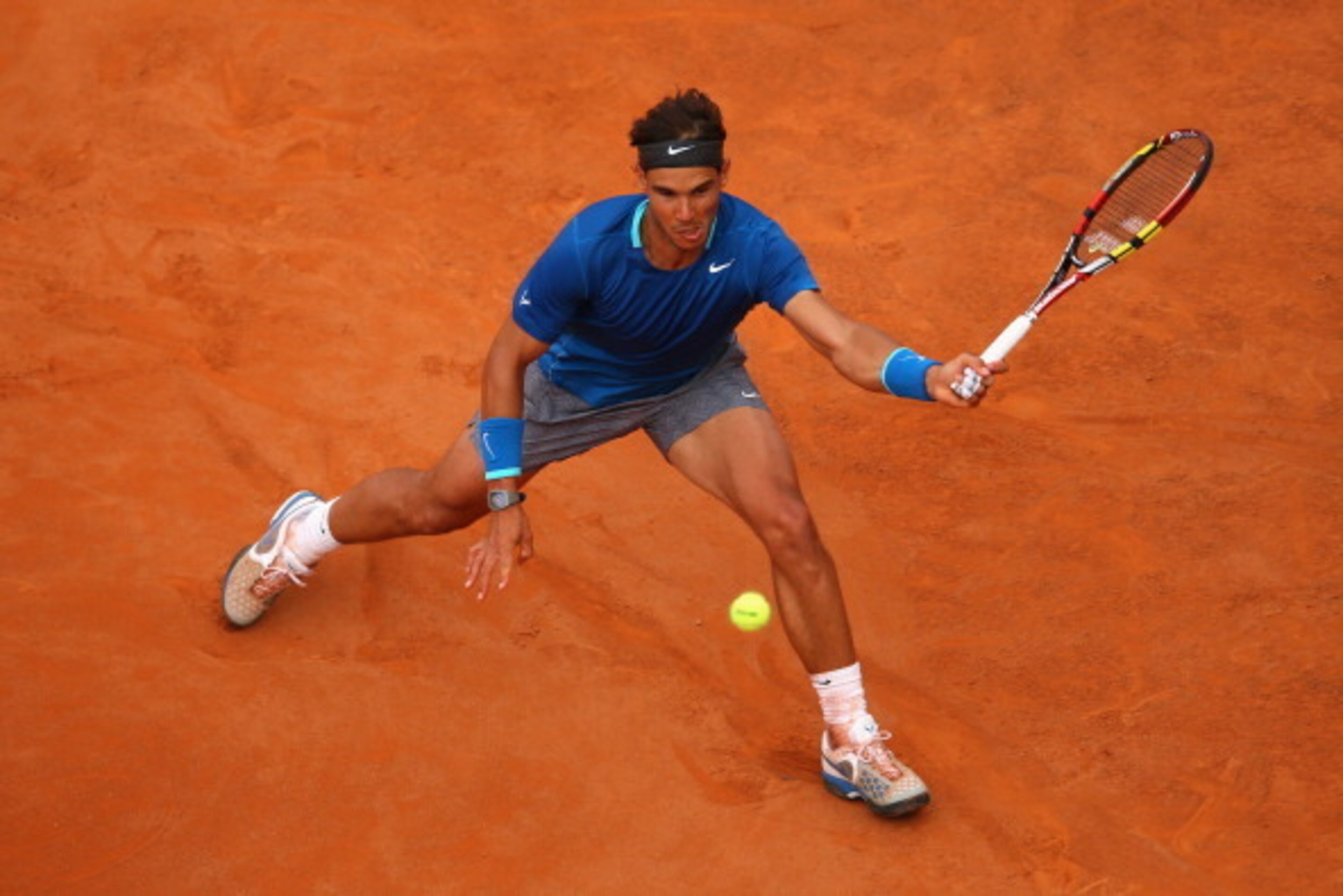 ROME, ITALY - MAY 18:  Rafael Nadal of Spain in action in his match against Novak Djokovic of Serbia in the final during day eight of the Internazionali BNL d'Italia tennis 2014 on May 18, 2014 in Rome, Italy.  (Photo by Julian Finney/Getty Images)
