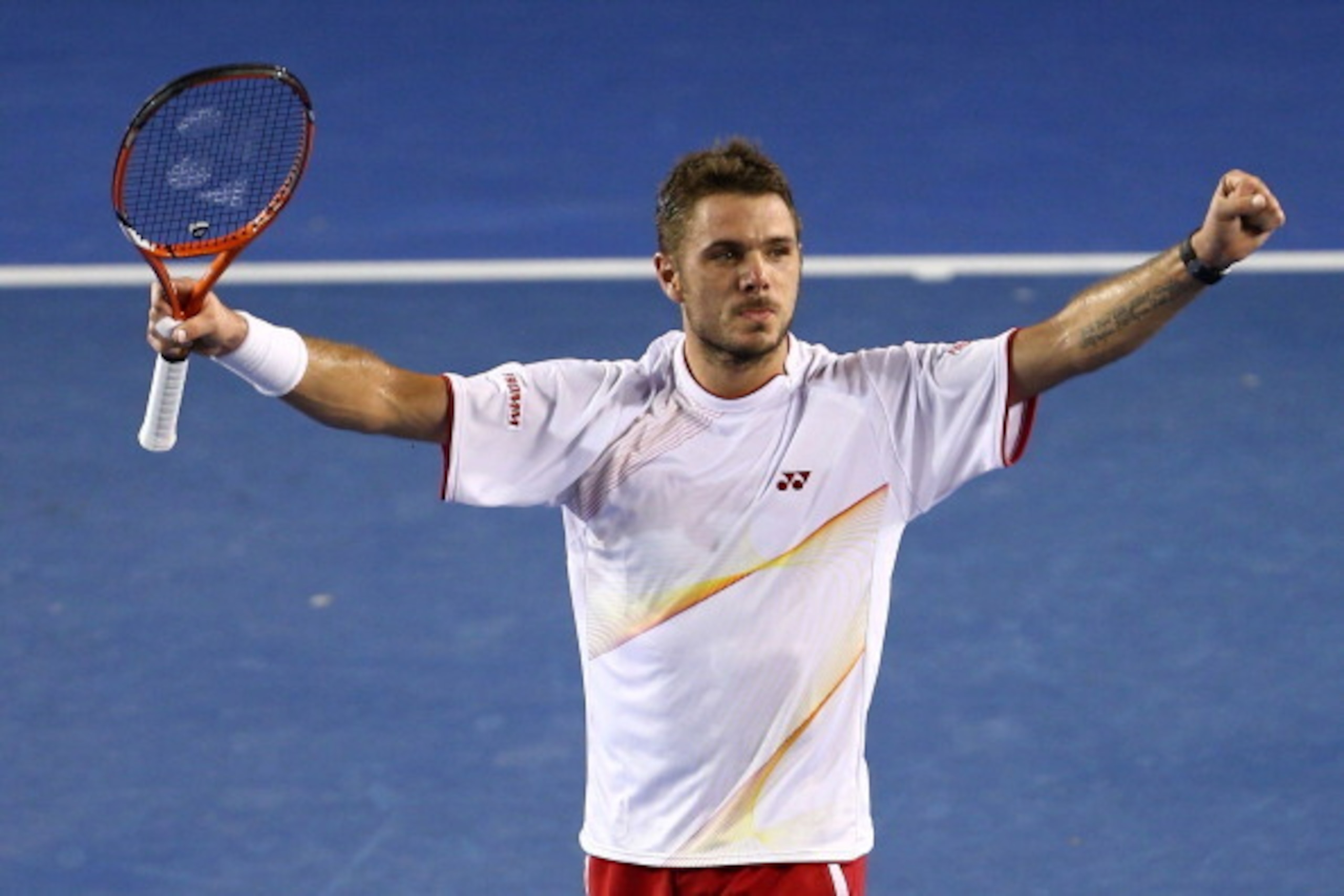 MELBOURNE, AUSTRALIA - JANUARY 26:  Stanislas Wawrinka of Switzerland celebrates winning championship point in his men's final match against Rafael Nadal of Spain during day 14 of the 2014 Australian Open at Melbourne Park on January 26, 2014 in Melbourne