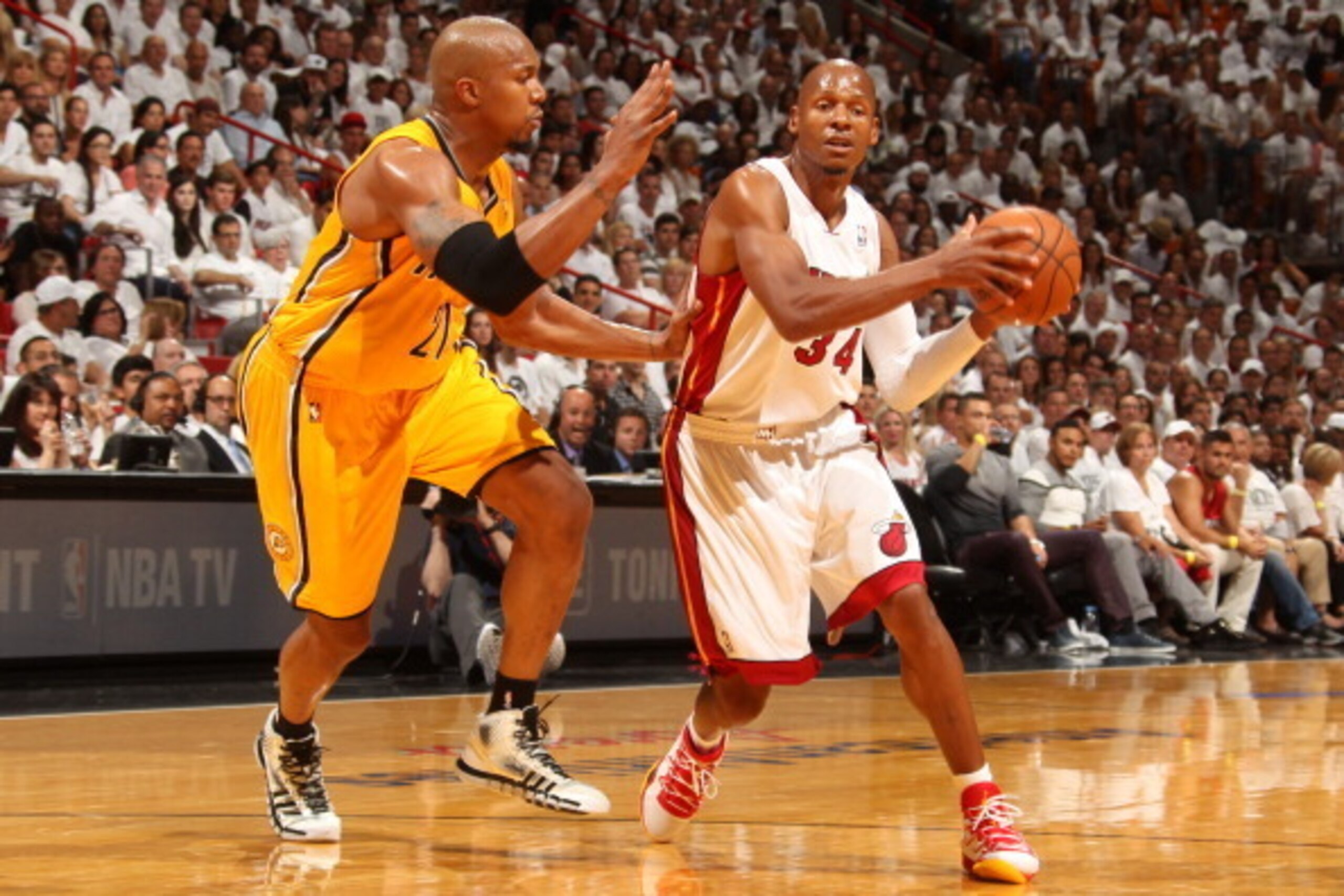 MIAMI, FL - May 24: Ray Allen #34 of the Miami Heat handles the ball against David West #21 of the Indiana Pacers in Game Three of the Eastern Conference Finals during the 2014 NBA playoffs at the American Airlines Arena in Miami, Florida on May 24, 2014.