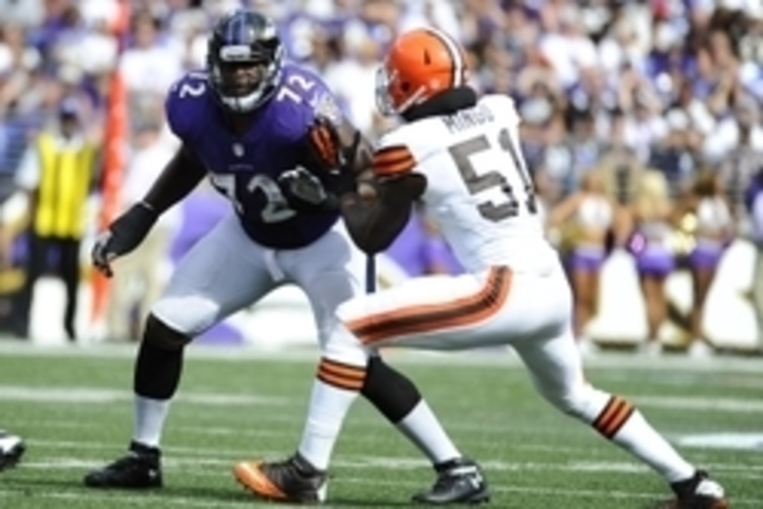 Sep 15, 2013; Baltimore, MD, USA; Baltimore Ravens guard Kelechi Osemele (72) prepares to block Cleveland Browns linebacker Barkevious Mingo (51) during the second half at M&T Bank Stadium. The Ravens won 14 - 6. Mandatory Credit: Brad Mills-USA TODAY Spo