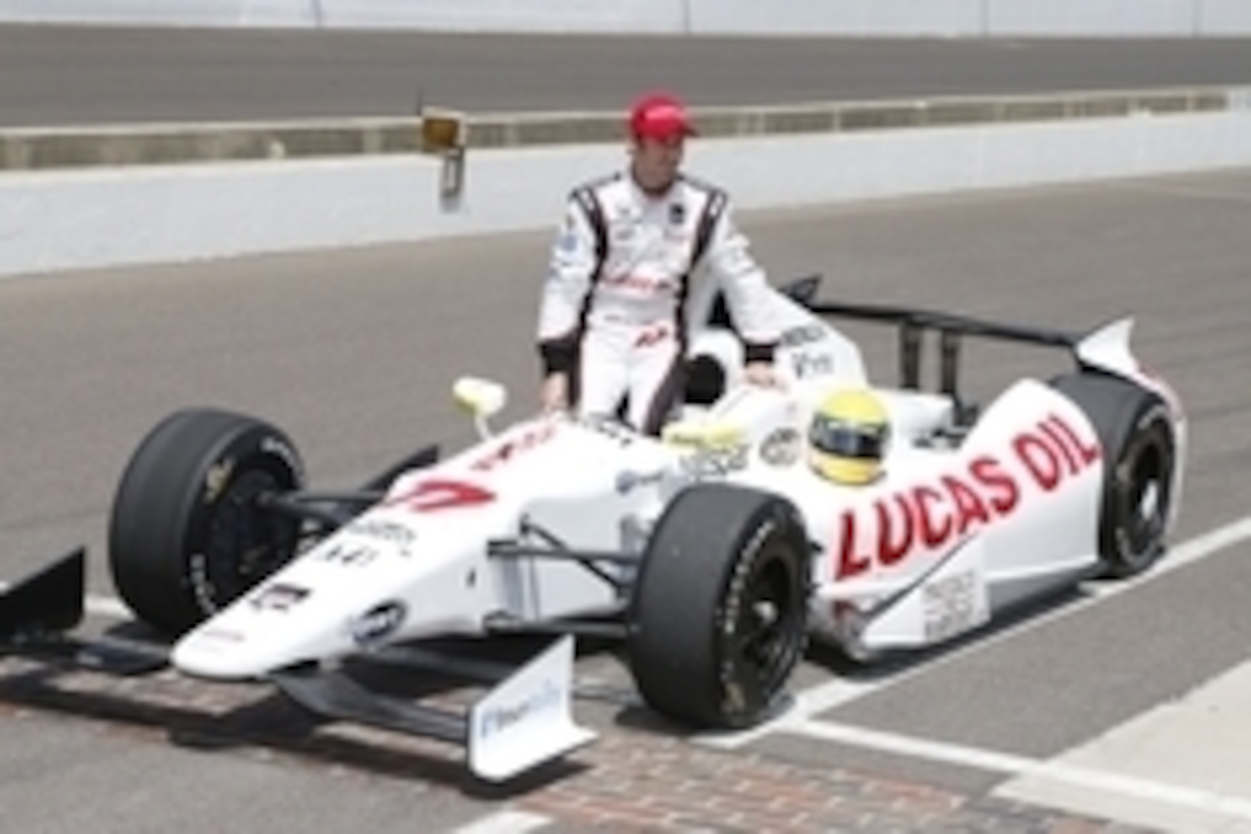 May 17, 2014; Indianapolis, IN, USA; IndyCar Series driver Simon Pagenaud poses for the traditional photo with his car after qualifying for the 2014 Indianapolis 500 at Indianapolis Motor Speedway. Mandatory Credit: Brian Spurlock-USA TODAY Sports