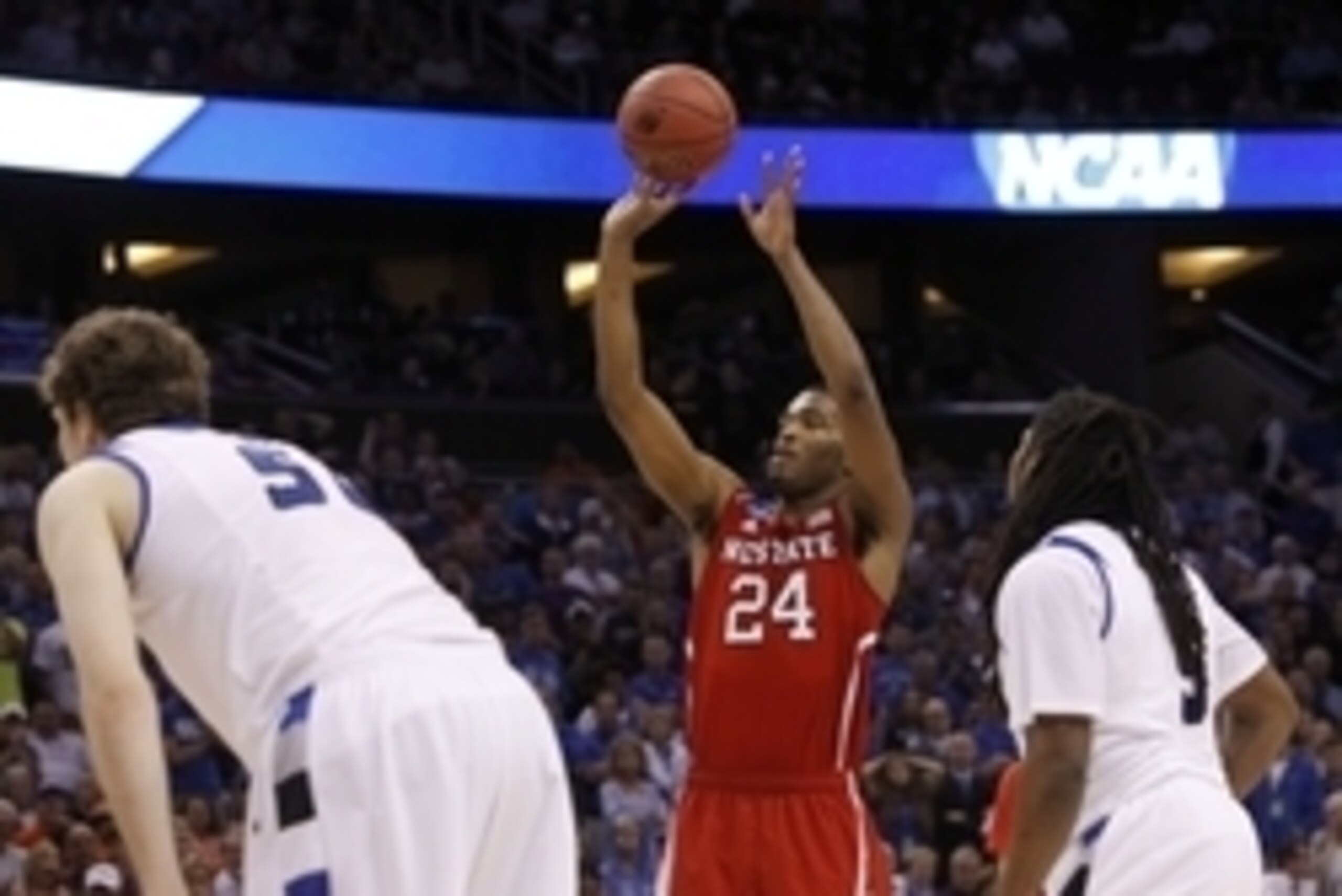 Mar 20, 2014; Orlando, FL, USA; North Carolina State Wolfpack forward T.J. Warren (24) shoots a free throw against the Saint Louis Billikens during the second half of a men's college basketball game during the second round of the 2014 NCAA Tournament at A