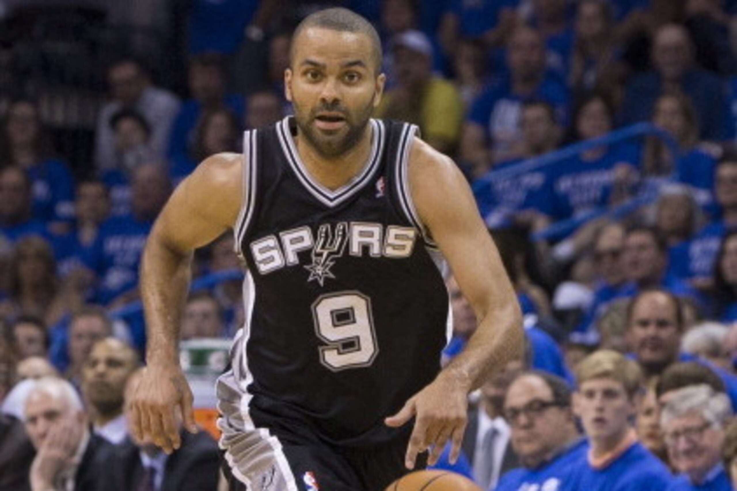 OKLAHOMA CITY, OK - May 25:  Tony Parker #9 of the San Antonio Spurs handles the ball against the Oklahoma City Thunder in Game 3 of the Western Conference Finals during the 2014 NBA Playoffs at the Chesapeake Arena on May 25, 2014 in Oklahoma City, Oklah