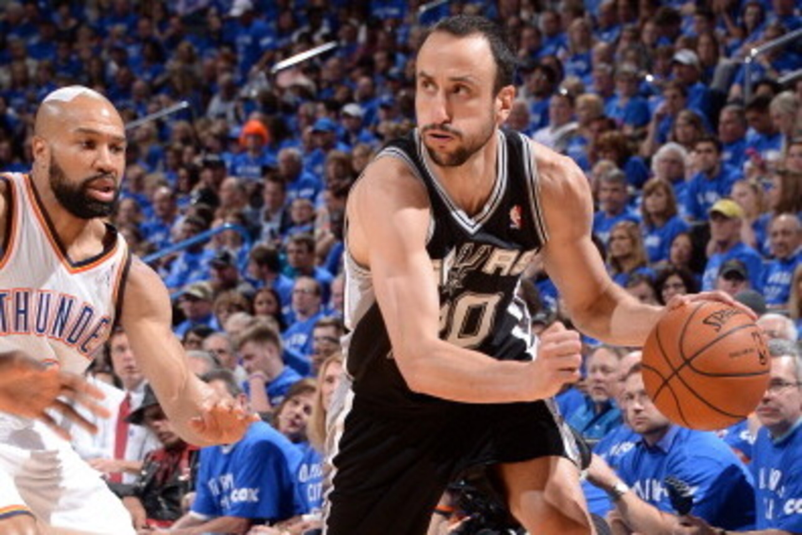 OKLAHOMA CITY, OK  MAY 25: Manu Ginobili #20 of the San Antonio Spurs handles the ball against the Oklahoma City Thunder in Game Three of the Western Conference Finals during the 2014 NBA Playoffs on May 25, 2014 at the Chesapeake Energy Arena in Oklahoma