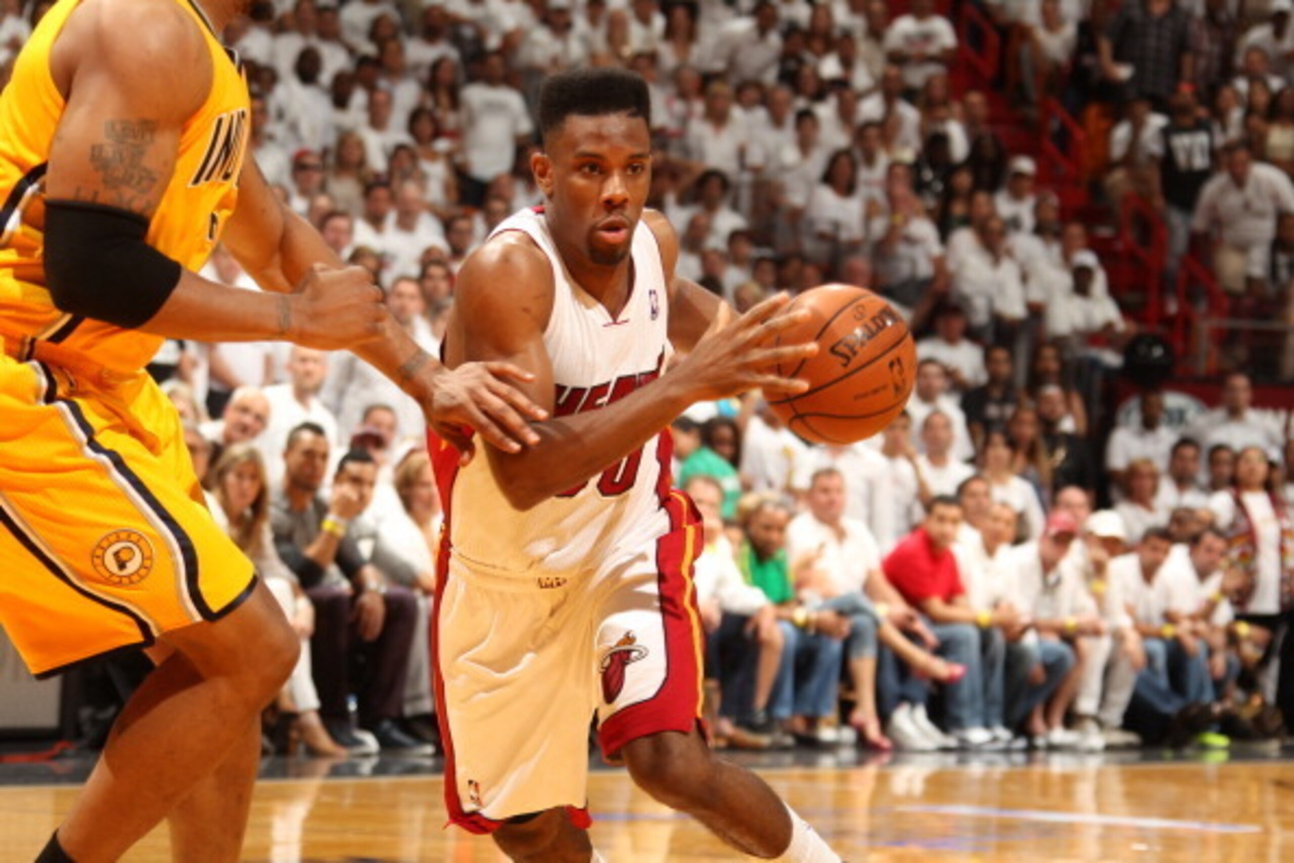 MIAMI, FL - May 24: Norris Cole #30 of the Miami Heat handles the ball against the Indiana Pacers in Game Three of the Eastern Conference Finals during the 2014 NBA playoffs at the American Airlines Arena in Miami, Florida on May 24, 2014. NOTE TO USER: U