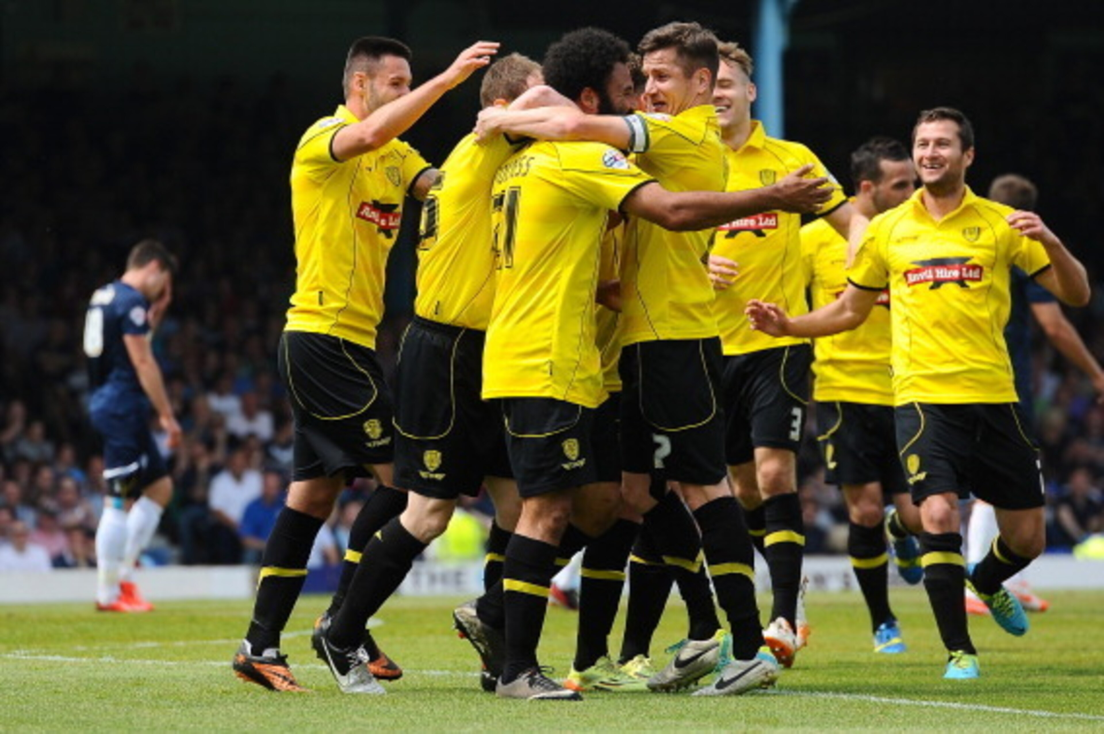 SOUTHEND, ENGLAND - MAY 17: Marcus Holness of Burton Albion celebrates scoring the 1st goal with team-mates during the Sky Bet League 2 Play Off Semi Final second leg match between Southend United and Burton Albion at Roots Hall on May 17, 2014 in Southe SOUTHEND, ENGLAND - MAY 17: Marcus Holness of Burton Albion celebrates scoring the 1st goal with team-mates during the Sky Bet League 2 Play Off Semi Final second leg match between Southend United and Burton Albion at Roots Hall on May 17, 2014 in Southe