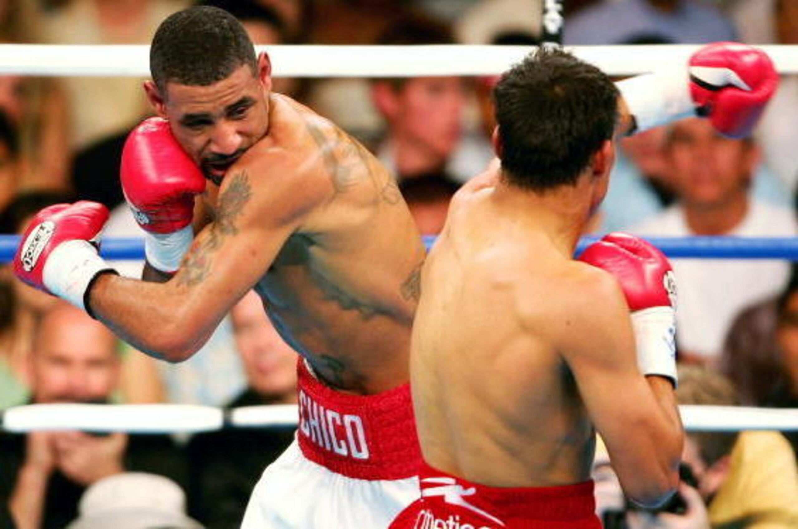 LAS VEGAS, NV - MAY 7: (L-R) Diego Corrales and Jose Luis Castillo swing left hooks during their World Lightweight Unification bout on May 7, 2005 at The Mandalay Bay in Las Vegas, Nevada. (Photo by Nick Laham/Getty Images). LAS VEGAS, NV - MAY 7: (L-R) Diego Corrales and Jose Luis Castillo swing left hooks during their World Lightweight Unification bout on May 7, 2005 at The Mandalay Bay in Las Vegas, Nevada. (Photo by Nick Laham/Getty Images).