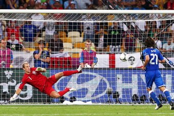 KIEV, UKRAINE - JUNE 24:  Andrea Pirlo of Italy chips the ball in the penalty shootout past Joe Hart of England during the UEFA EURO 2012 quarter final match between England and Italy at The Olympic Stadium on June 24, 2012 in Kiev, Ukraine.  (Photo by Al