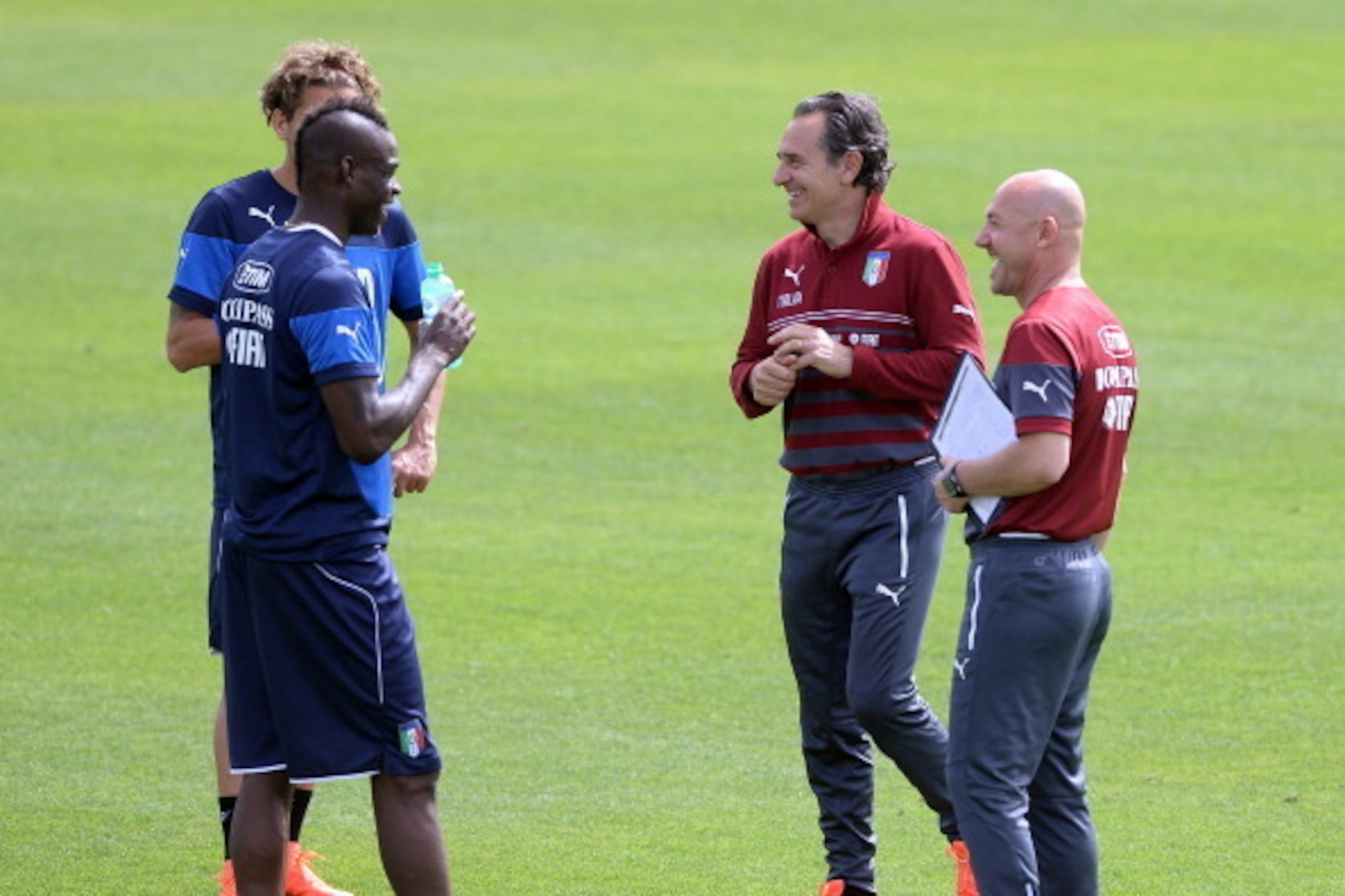 FLORENCE, ITALY - MAY 22:  (L-R) Alessio Cerci, Mario Balotelli, head coach Italy Cesare Prandelli and fitness coach Giambattista Venturati during Italy training session at Coverciano on May 22, 2014 in Florence, Italy.  (Photo by Claudio Villa/Getty Imag