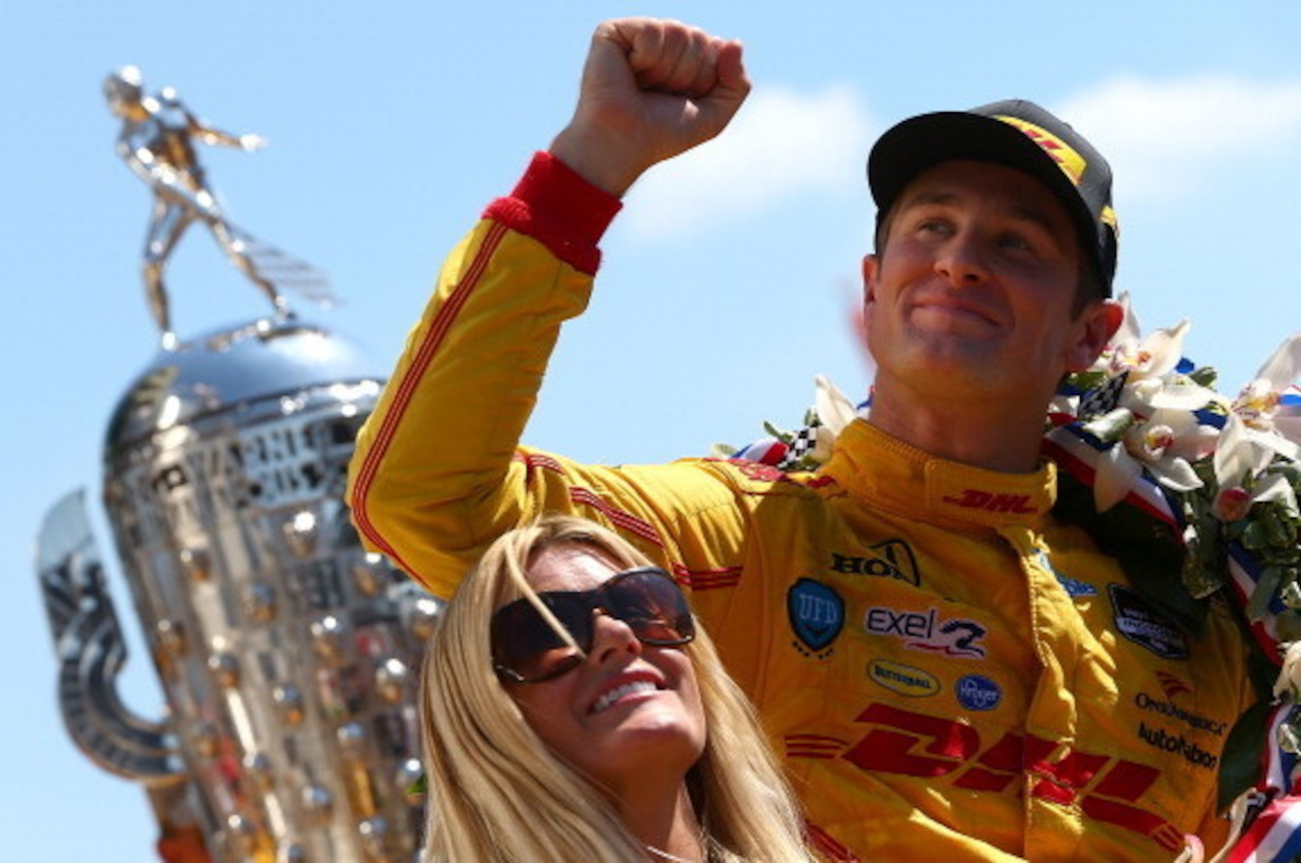 INDIANAPOLIS - MAY 25:  Ryan Hunter-Reay driver of the #28 DHL Andretti Autosport Chevrolet Dallara celebrates with is wife Beccy after winning the 98th running of the Indianapolis 500 Mile Race on May 25, 2014 at the Indianapolis Motor Speedway in Indian