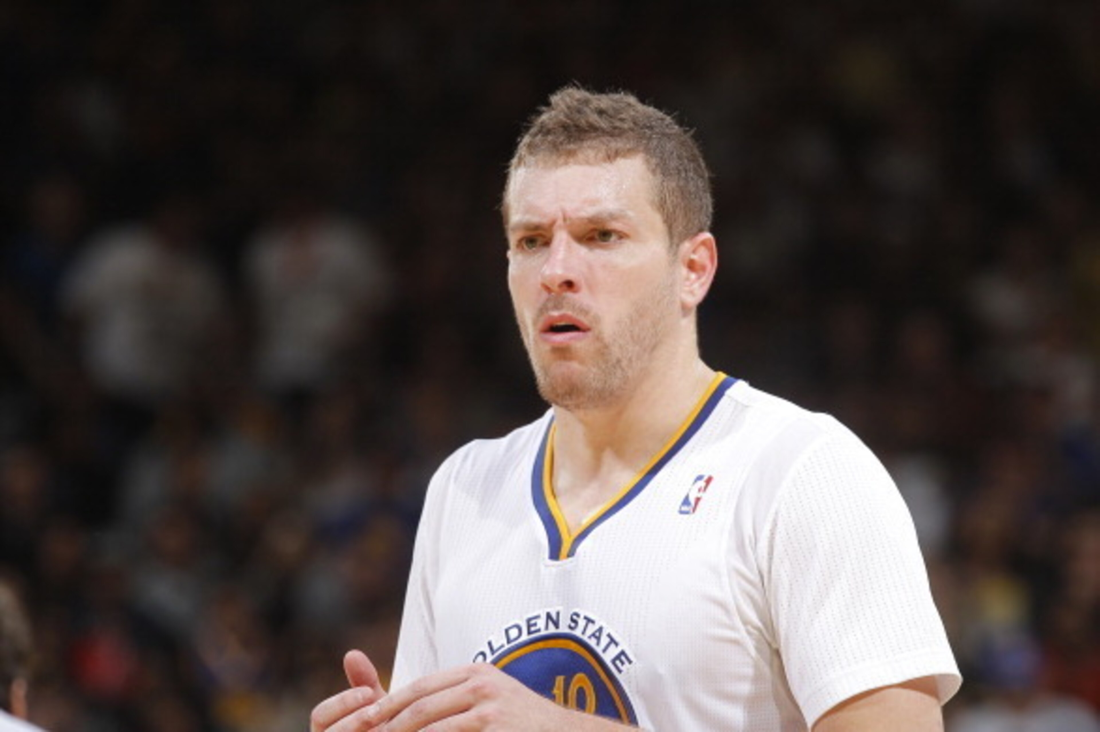 OAKLAND, CA - MARCH 22: David Lee #10 of the Golden State Warriors in a game against the San Antonio Spurs on March 22, 2014 at Oracle Arena in Oakland, California. NOTE TO USER: User expressly acknowledges and agrees that, by downloading and or using thi