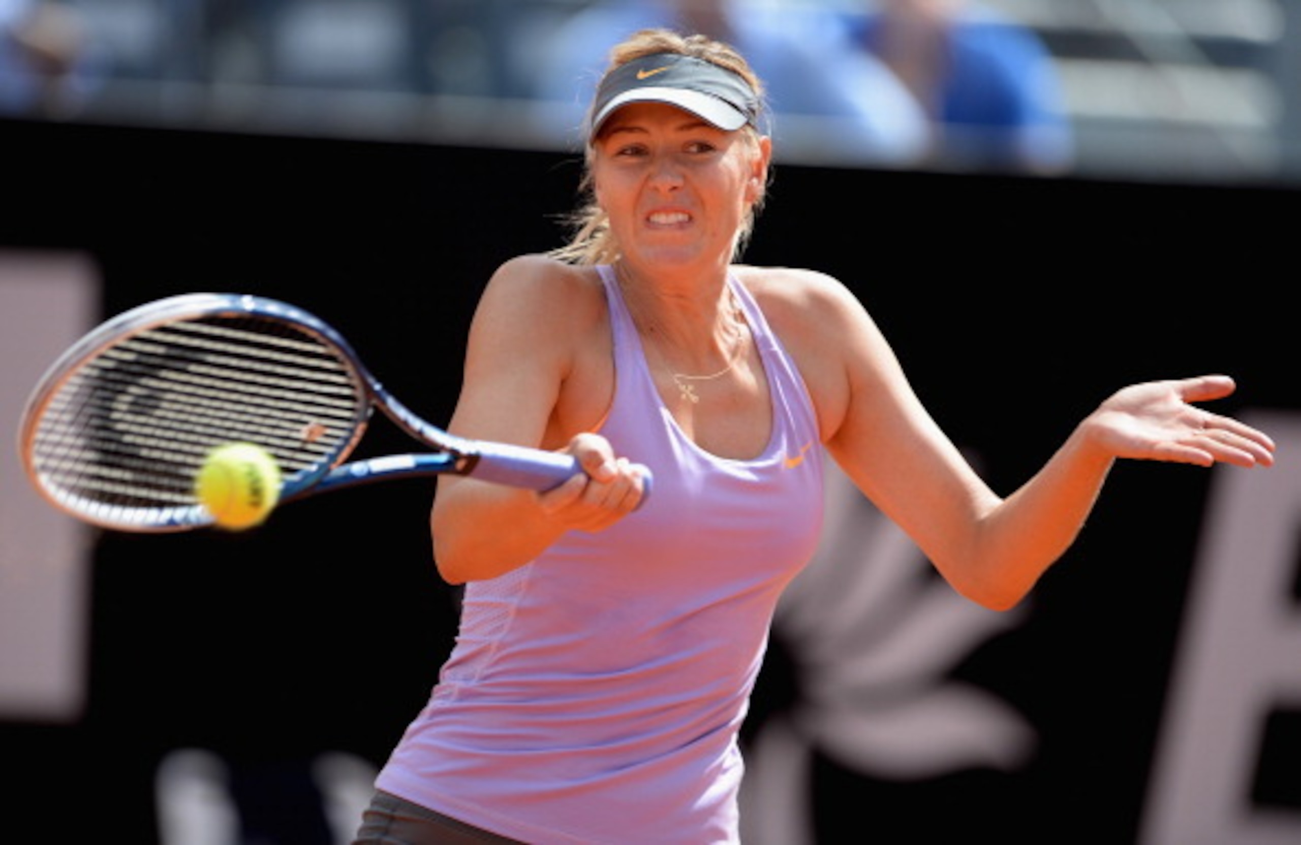 ROME, ITALY - MAY 15:  Maria Sharapova of Russia in action during her game against Ana Ivanovic of Serbia during day 5 of the Internazionali BNL d'Italia 2014 on May 15, 2014 in Rome, Italy.  (Photo by Michael Regan/Getty Images)