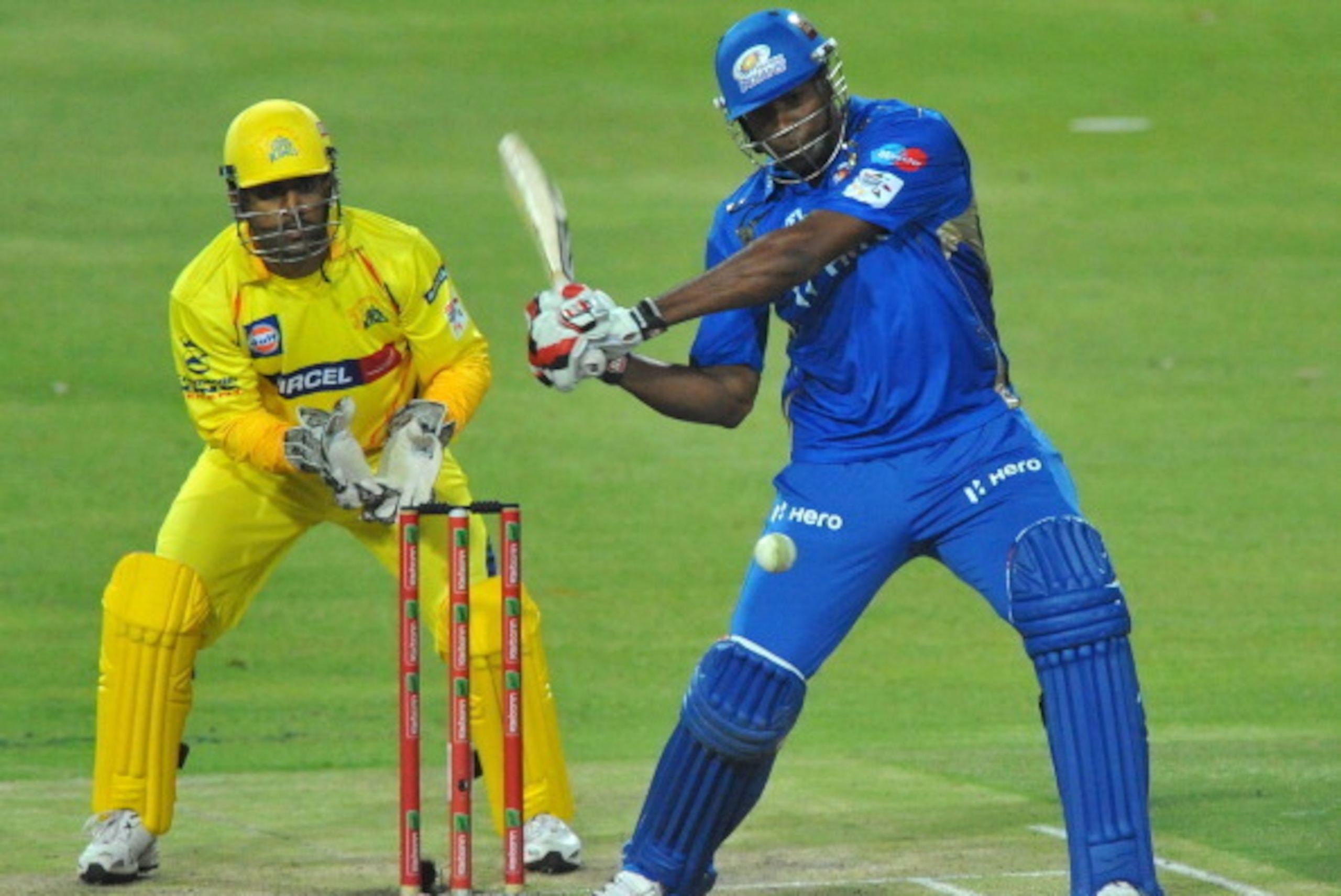 JOHANNESBURG, SOUTH AFRICA - OCTOBER 20: Kieron Pollard of Mumbai hits a six during the Karbonn Smart CLT20 match between Chennai Super Kings and Mumbai Indians at Bidvest Wanderers Stadium on October 20, 2012 in Johannesburg, South Africa. (Photo by Duif