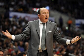 LOS ANGELES, CA - DECEMBER 13:  Los Angeles Clippers Head Coach Mike Dunleavy calls for a foul from the sideline during the game against the San Antonio Spurs at Staples Center on December 13, 2009 in Los Angeles, California.  NOTE TO USER: User expressly