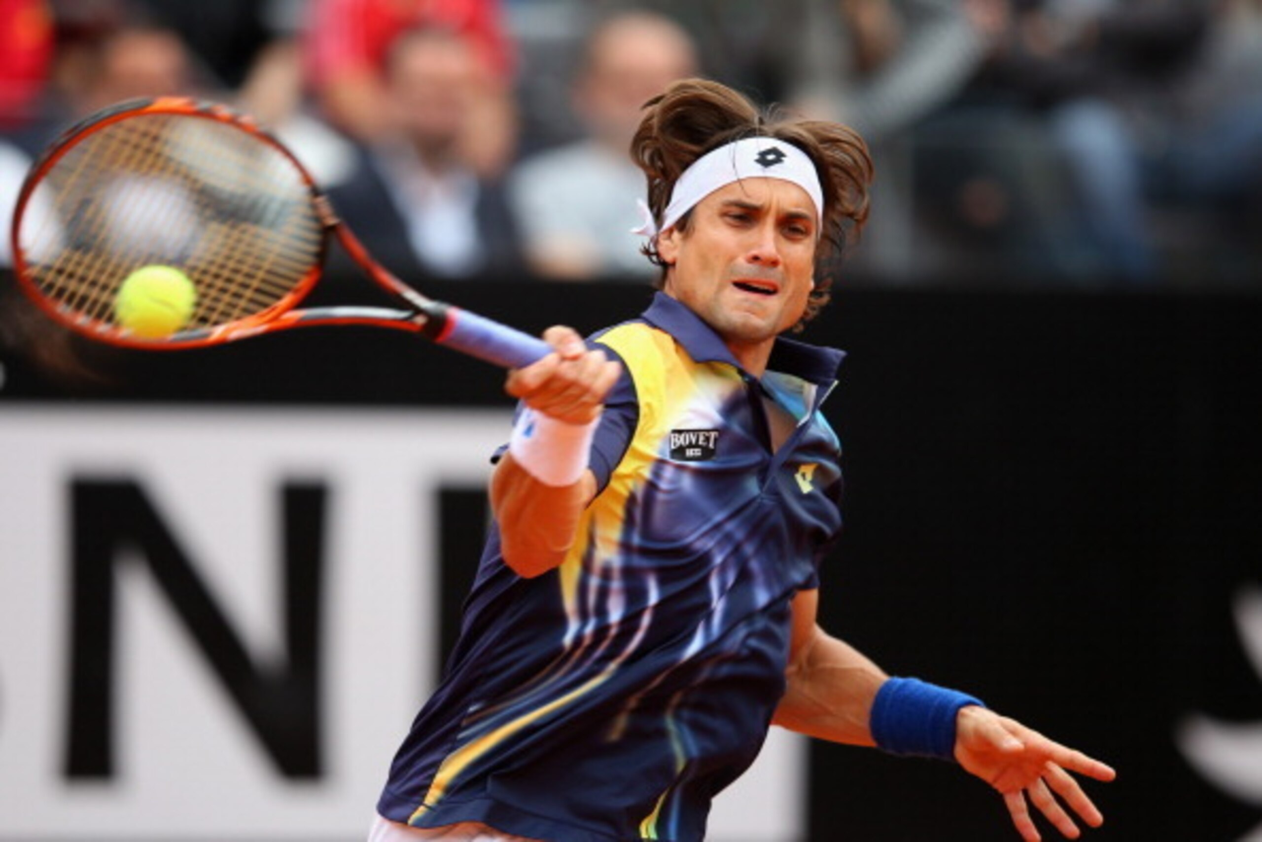 ROME, ITALY - MAY 16:  David Ferrer of Spain in action against Novak Djokovic of Serbia during day six of the Internazionali BNL d'Italia tennis 2014 on May 16, 2014 in Rome, Italy.  (Photo by Julian Finney/Getty Images)