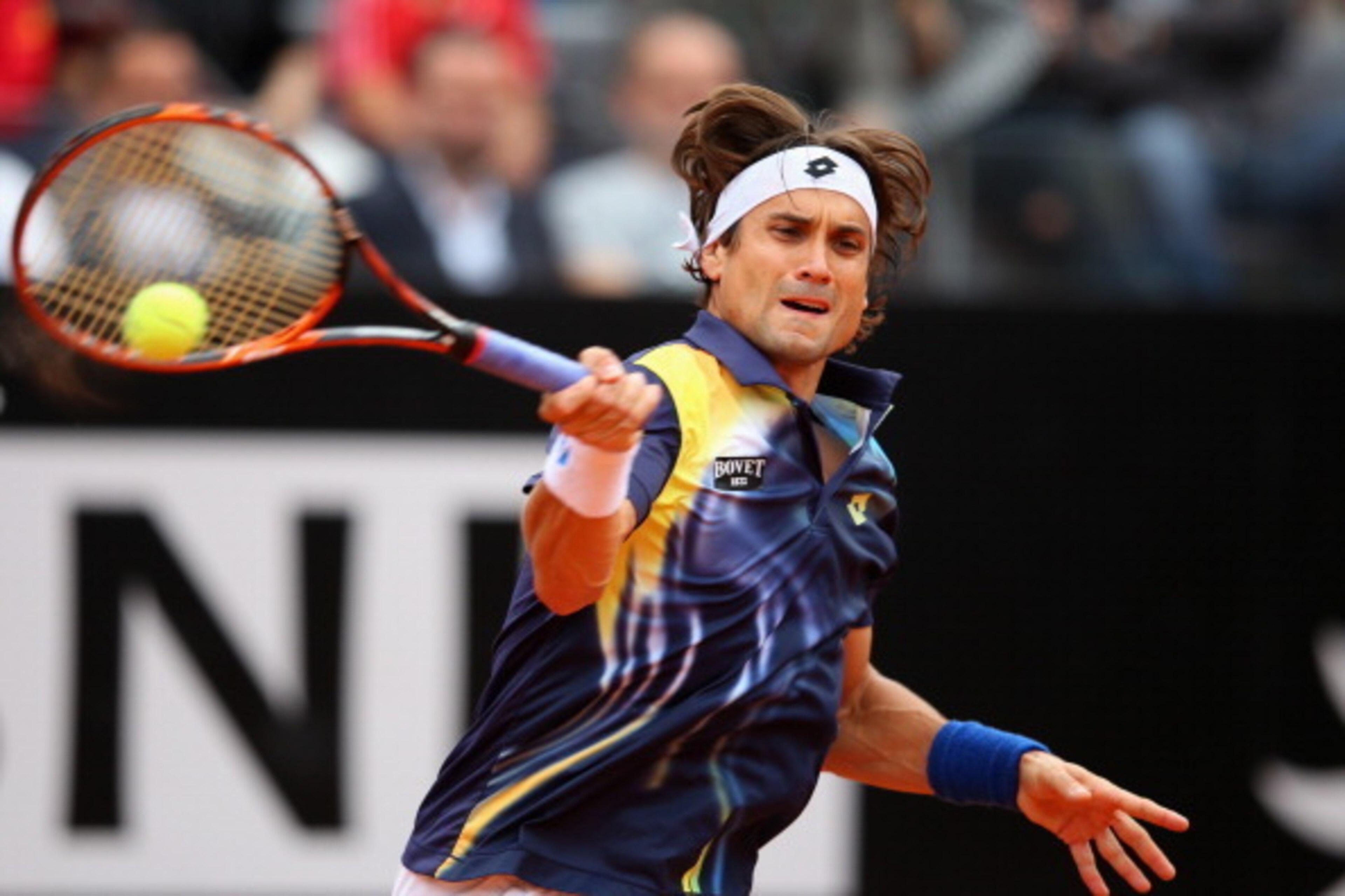 ROME, ITALY - MAY 16:  David Ferrer of Spain in action against Novak Djokovic of Serbia during day six of the Internazionali BNL d'Italia tennis 2014 on May 16, 2014 in Rome, Italy.  (Photo by Julian Finney/Getty Images)