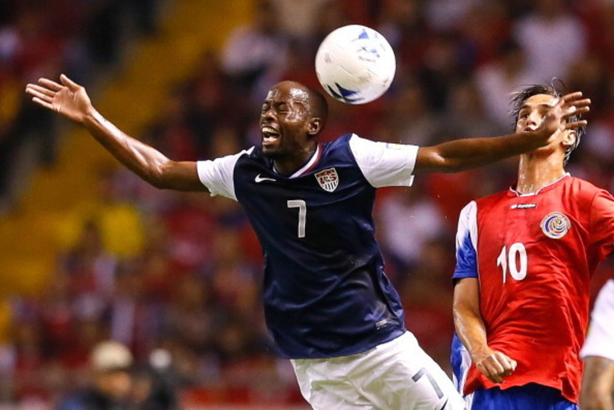 SAN JOSE, COSTA RICA - SEPTEMBER 06:  DaMarcus Beasley #7 of the United States is fouled by Bryan Ruiz #10 while battling for a header during the FIFA 2014 World Cup Qualifier at Estadio Nacional on September 6, 2013 in San Jose, Costa Rica.  (Photo by Ke