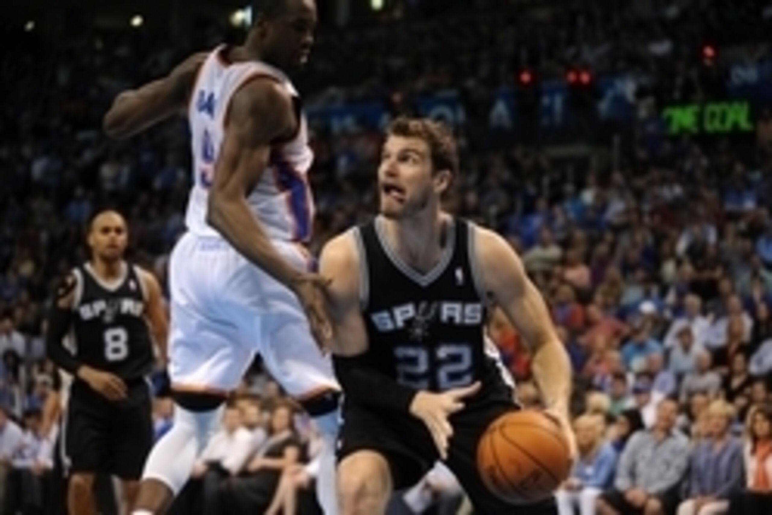 Apr 3, 2014; Oklahoma City, OK, USA; San Antonio Spurs center Tiago Splitter (22) drives to the basket against Oklahoma City Thunder forward Serge Ibaka (9) during the third quarter at Chesapeake Energy Arena. Mandatory Credit: Mark D. Smith-USA TODAY Spo