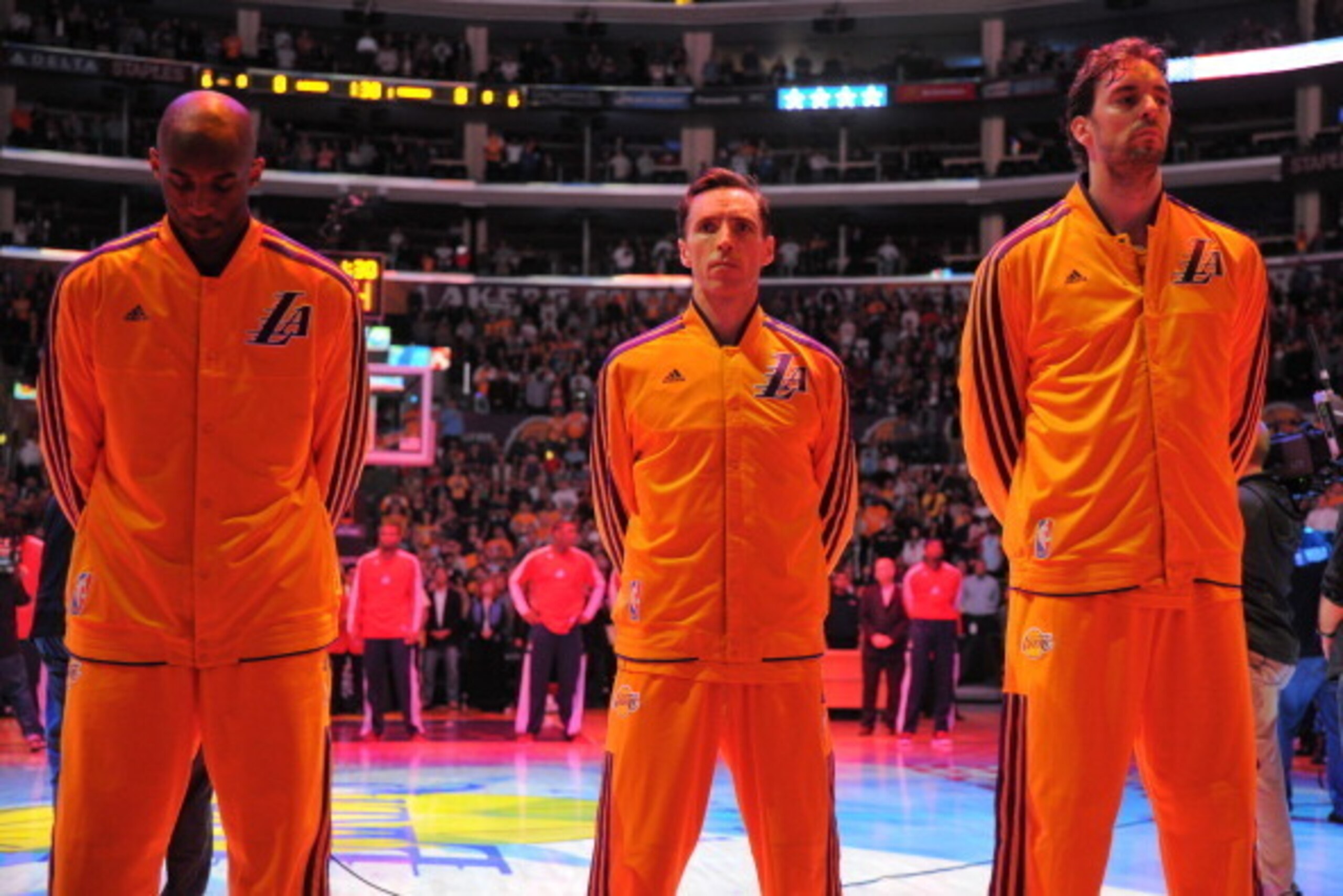 LOS ANGELES, CA - MARCH 22: Kobe Bryant #24, Steve Nash #10, and Pau Gasol #16 of the Los Angeles Lakers look on during the performance of the National Anthem before playing the Washington Wizards at Staples Center on March 22, 2013 in Los Angeles, Califo