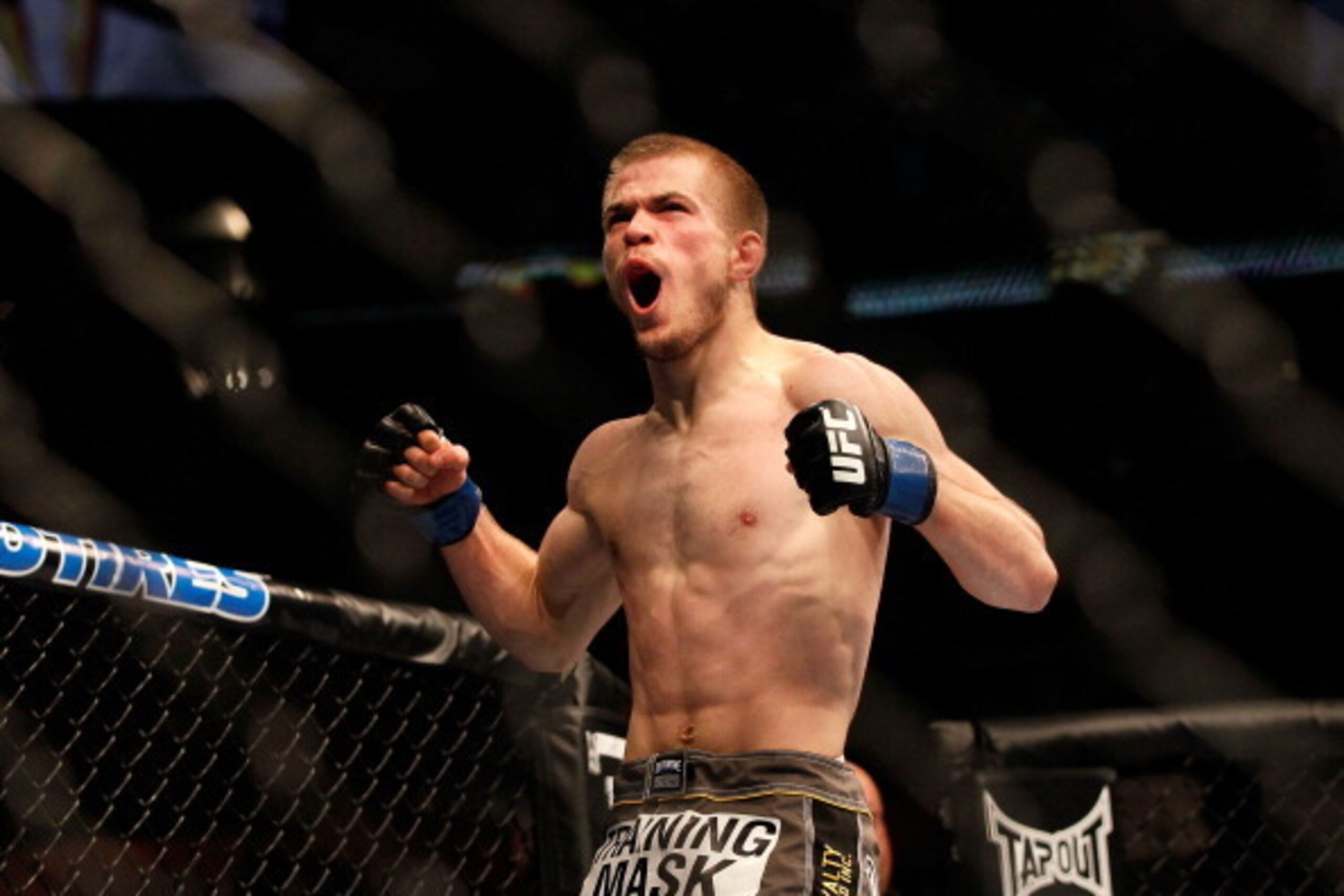 ATLANTA, GA - APRIL 21:  Michael McDonald celebrates defeating Miguel Angel Torres by knockout in the first round during their Bantamweight bout for UFC 145 at Philips Arena on April 21, 2012 in Atlanta, Georgia.  (Photo by Kevin C. Cox/Getty Images)