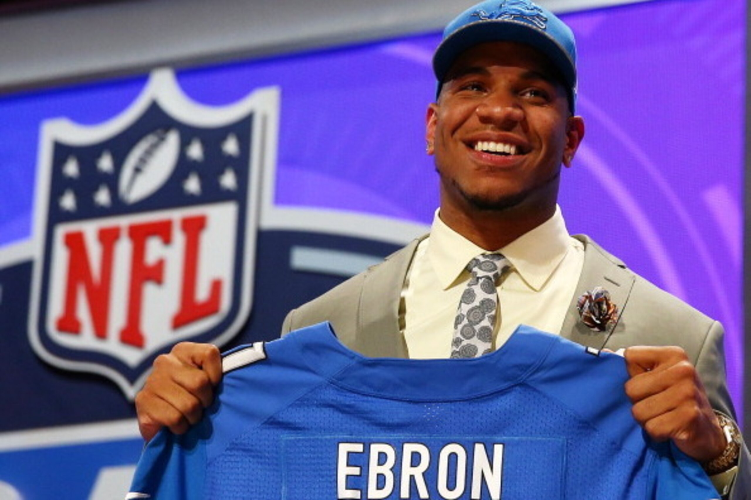 NEW YORK, NY - MAY 08:  Eric Ebron of the North Carolina Tar Heels poses with a jersey after he was picked #10 overall by the Detroit Lions during the first round of the 2014 NFL Draft at Radio City Music Hall on May 8, 2014 in New York City.  (Photo by E