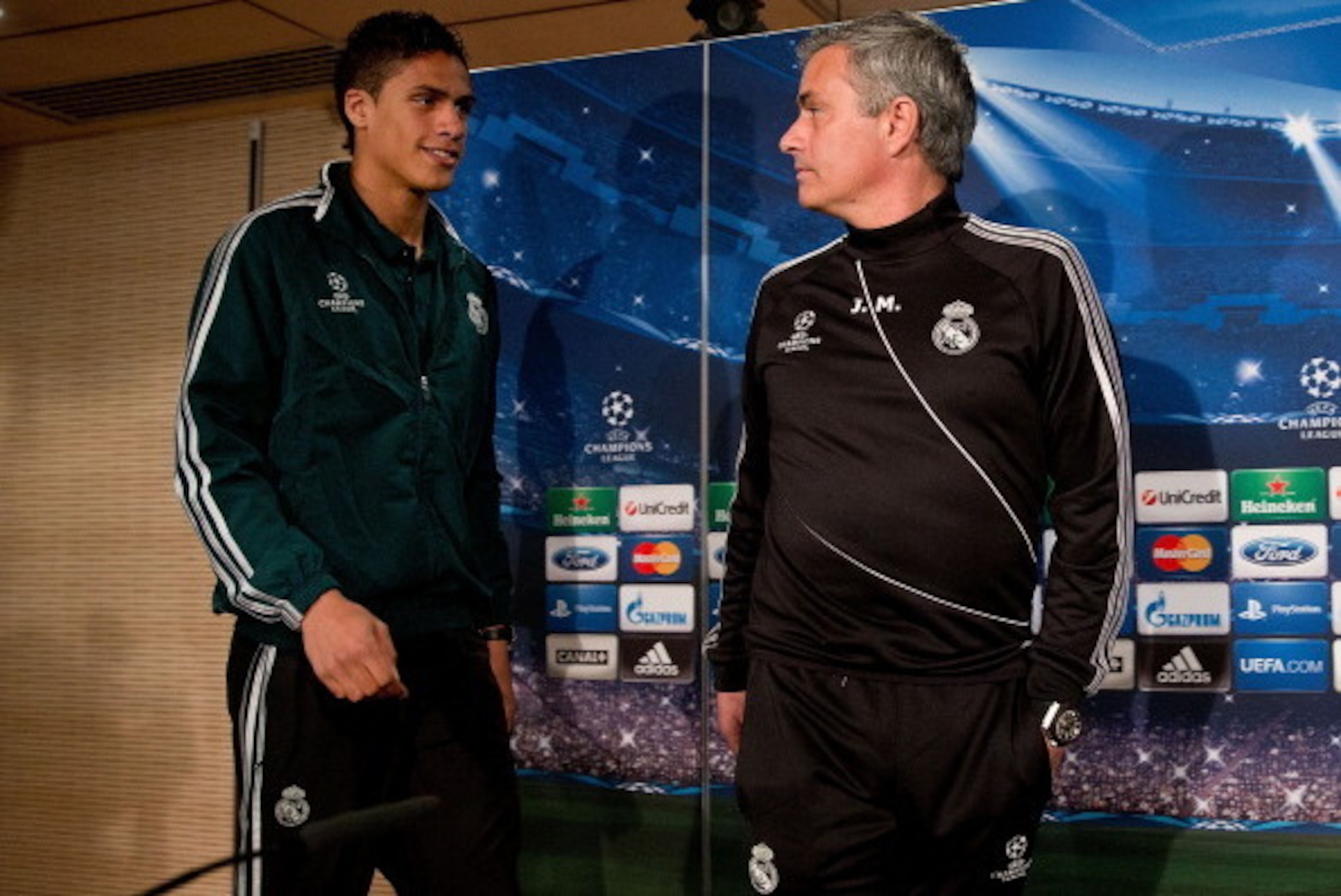 MADRID, SPAIN - APRIL 02:  Head coach Jose Mourinho (R) and Real madrid player Raphael varane prior to start a press conference ahead of the UEFA Champions League Quarterfinal match between Real Madrid and Galatasaray AS at Santiago Bernabeu Stadium on Ap
