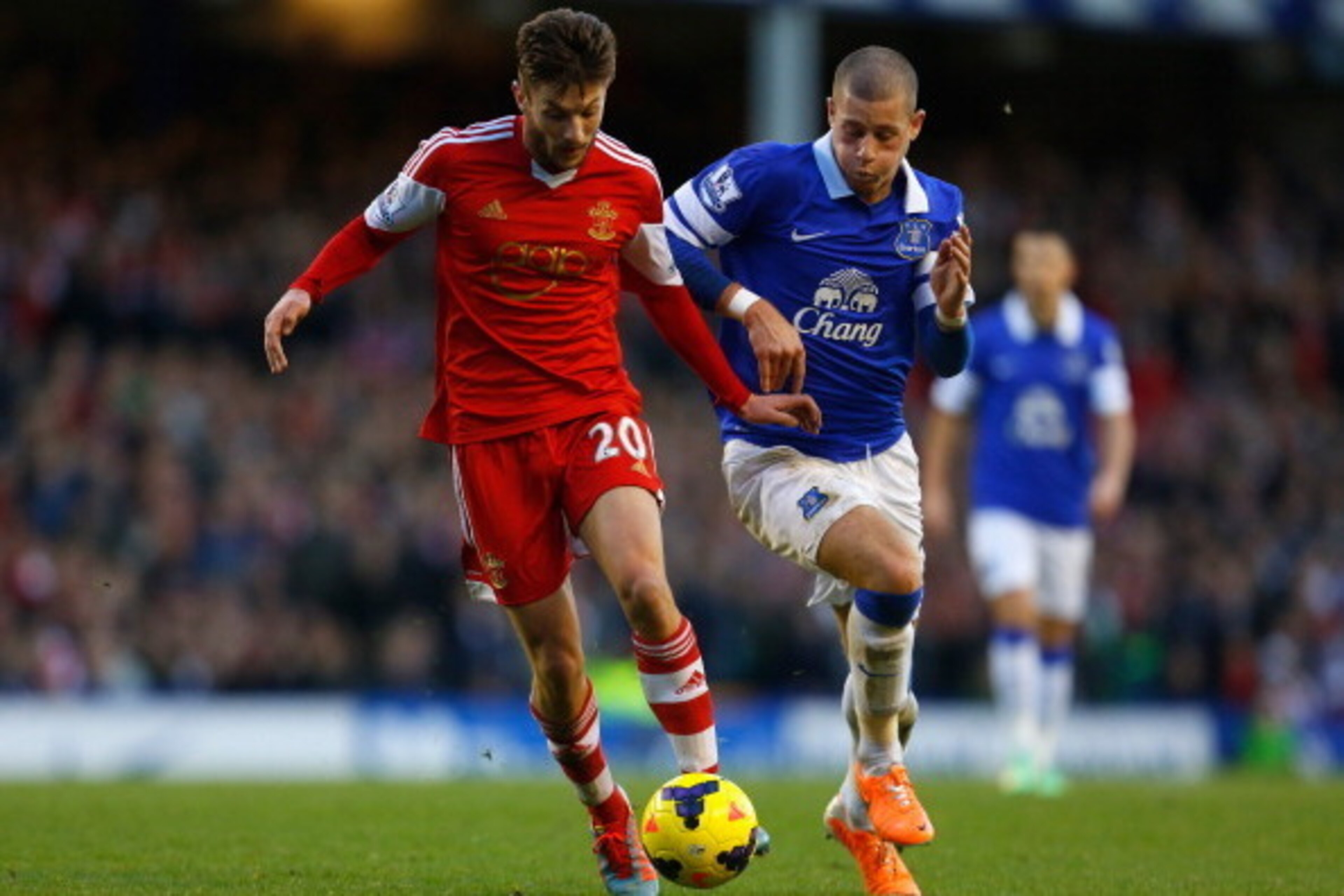 LIVERPOOL, ENGLAND - DECEMBER 29:  Adam Lallana of Southampton competes with Ross Barkley of Everton during the Barclays Premier League match between Everton and Southampton at Goodison Park on December 29, 2013 in Liverpool, England.  (Photo by Paul Thom