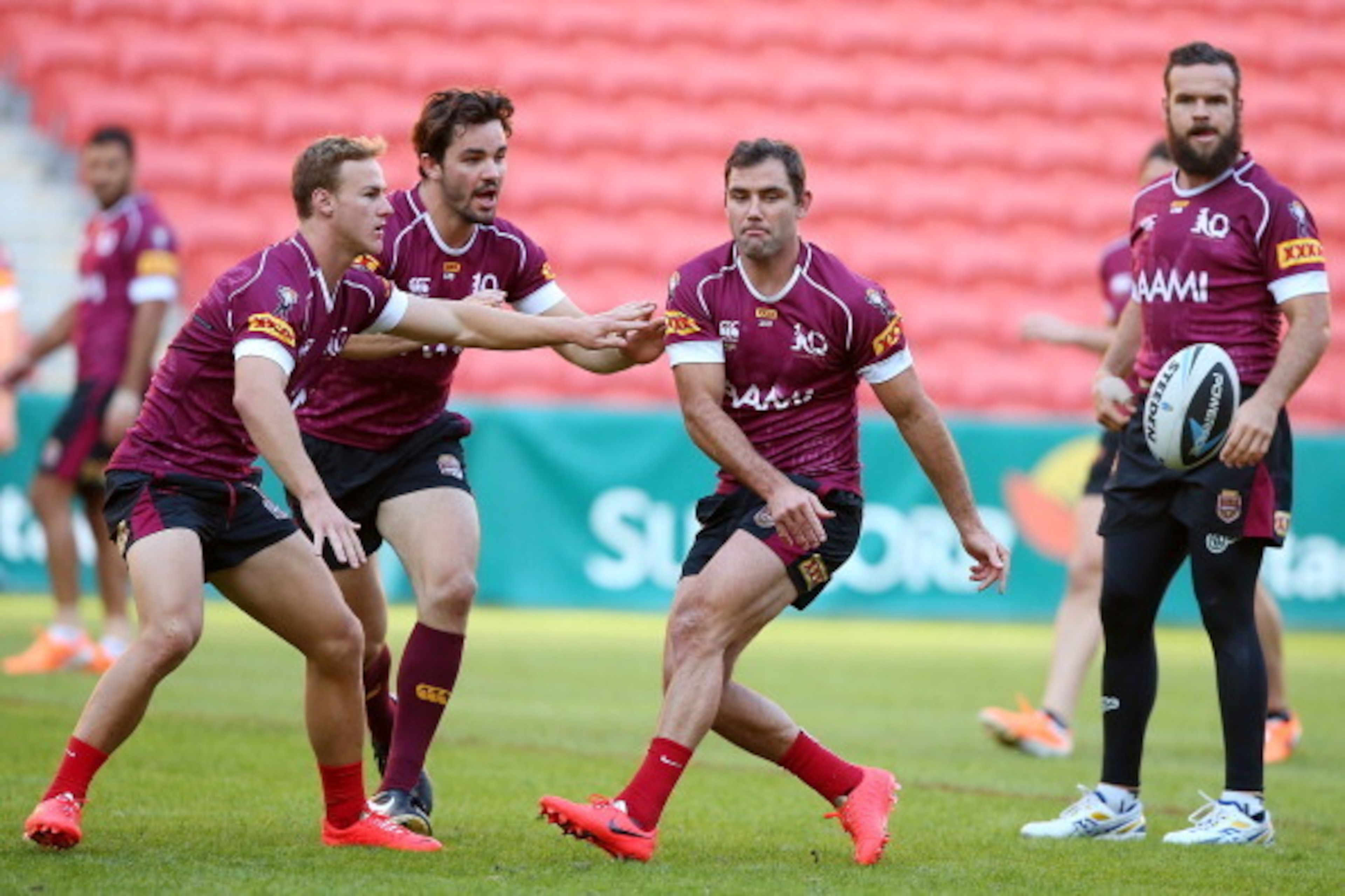 BRISBANE, AUSTRALIA - MAY 27:  Cameron Smith passes during the Queensland Maroons State of Origin Captain's Run at Suncorp Stadium on May 27, 2014 in Brisbane, Australia.  (Photo by Chris Hyde/Getty Images)