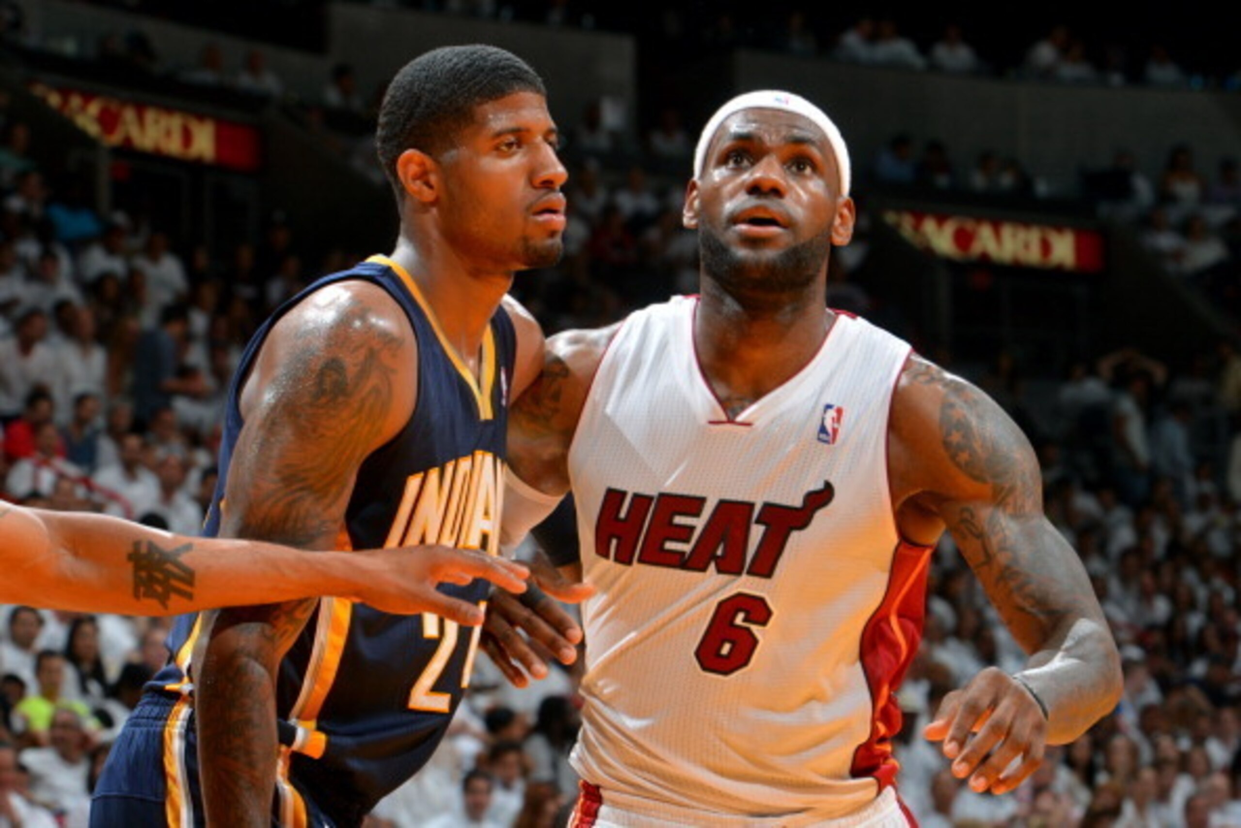 MIAMI, FL - MAY 26: Paul George #24 of the Indiana Pacers battles for position against LeBron James #6 of the Miami Heat in Game Four of the Eastern Conference Semifinals during the 2014 NBA Playoffs on May 26, 2014 at American Airlines Arena in Miami, Fl